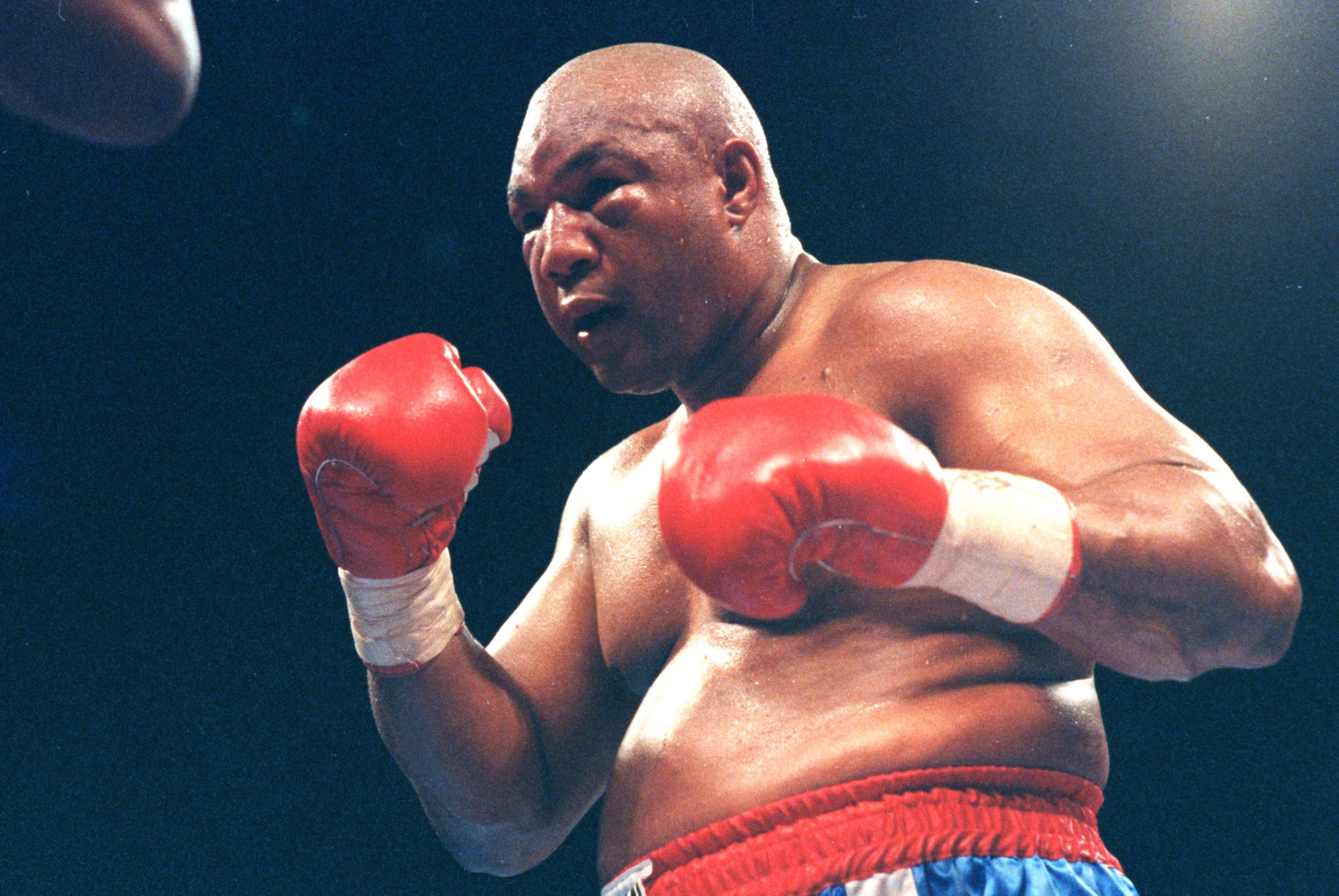 11 APR 1992:  GEORGE FOREMAN IN ACTION AGAINST ALEX STEWART DURING THEIR 1992 HEAVYWEIGHT BOUT. Mandatory Credit: Holly Stein/ALLSPORT