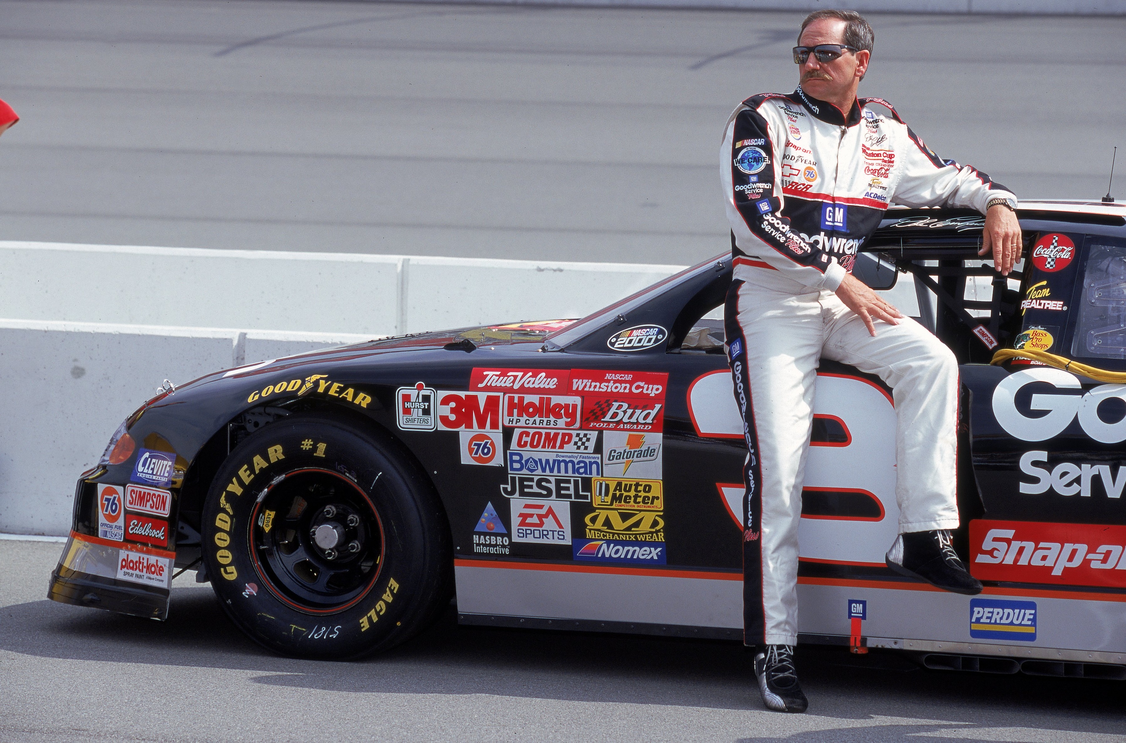 30 Apr 2000: Dale Earnhardt Sr. poses with his car during the NAPA Auto Parts 500, Part of the NASCAR Winston Cup Series, at the California Speedway in Fontana, California. Mandatory Credit: Jon Ferrey /Allsport 30 Apr 2000: Dale Earnhardt Sr. poses with his car during the NAPA Auto Parts 500, Part of the NASCAR Winston Cup Series, at the California Speedway in Fontana, California. Mandatory Credit: Jon Ferrey /Allsport