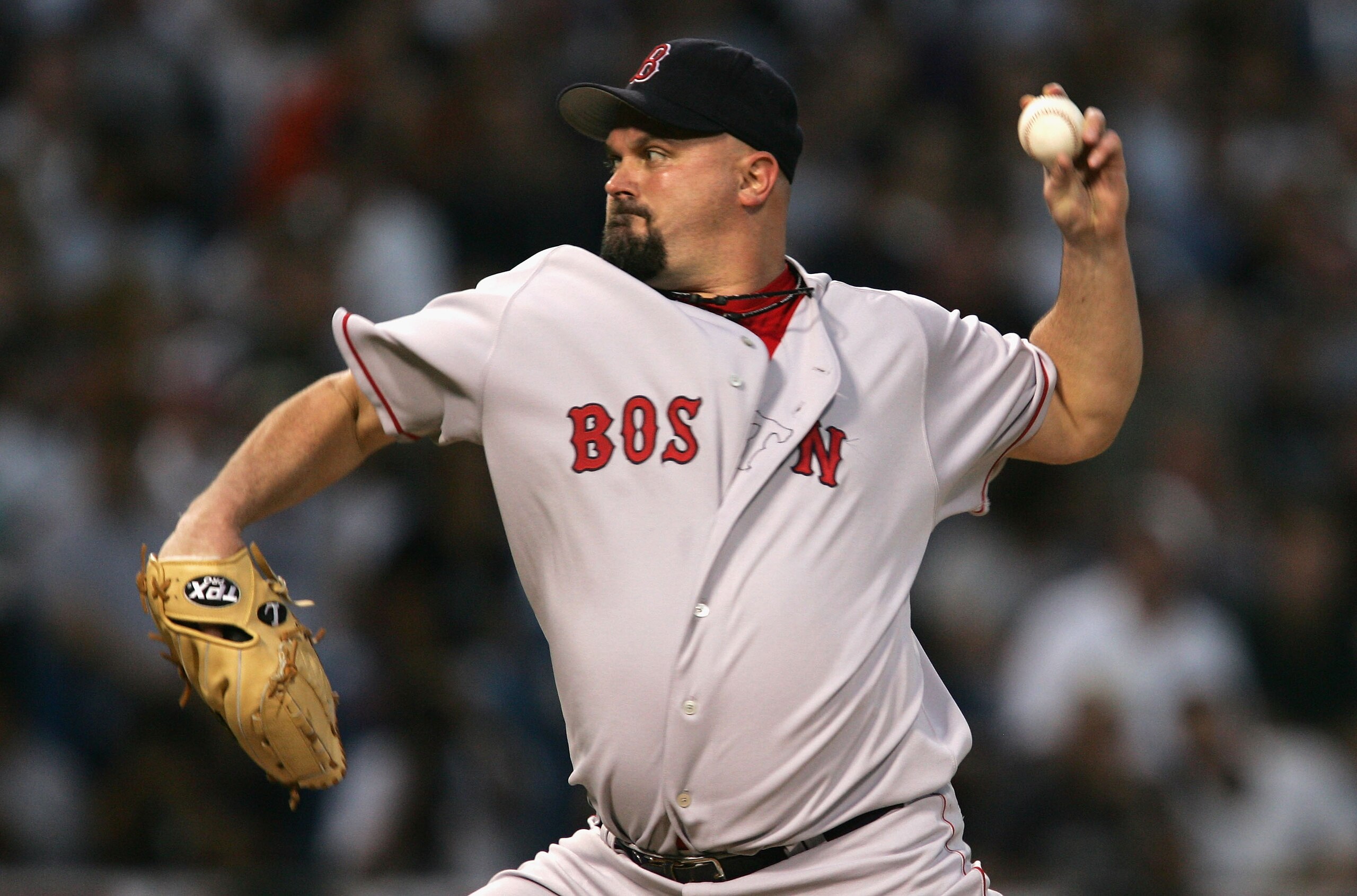CHICAGO - OCTOBER 5:  Starting pitcher David Wells #16 of the Boston Red Sox throws a pitch against the Chicago White Sox during the first inning of Game Two of the American League Division Series at U.S. Celluar Field on October 5, 2005 in Chicago, Illin