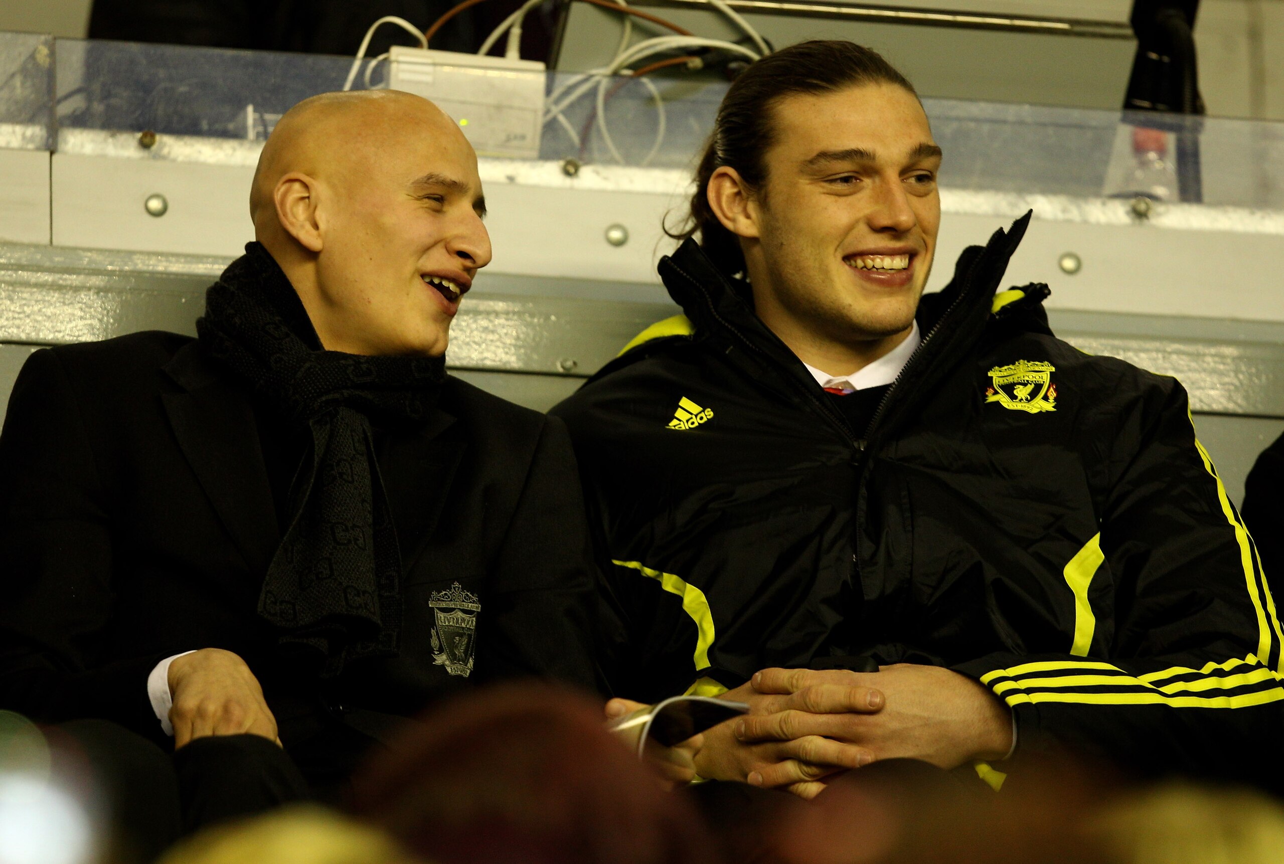 LIVERPOOL, ENGLAND - FEBRUARY 24:  Andy Carroll (R) of Liverpool watches from the stands during the UEFA Europa League Round of 32 2nd leg match beteween Liverpool and Sparta Prague at Anfield on February 24, 2011 in Liverpool, England.  (Photo by Richard