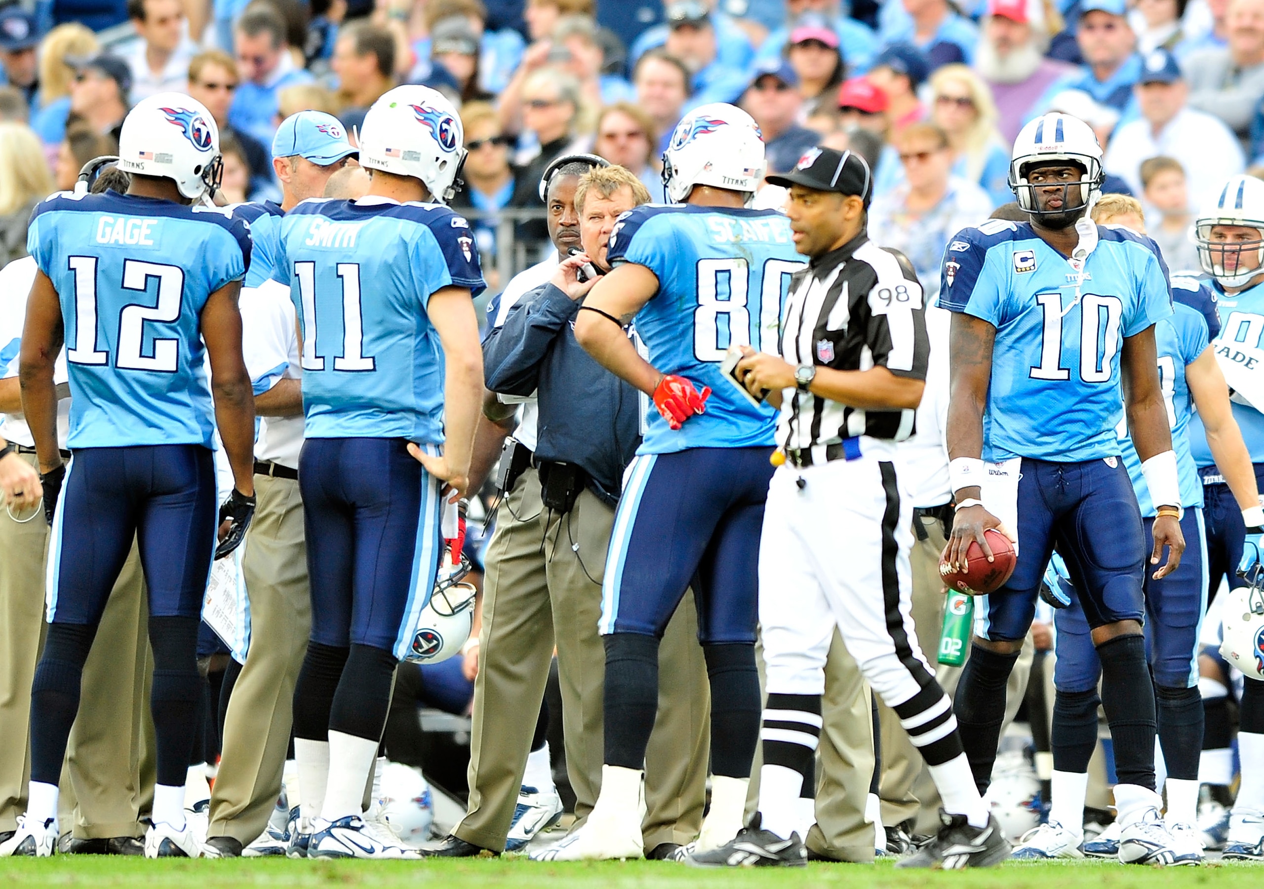 NASHVILLE, TN - NOVEMBER 21:  Quarterback Vince Young #11 of the Tennessee Titans stands outside of the offensive huddle during a timeout after leaving a game against the Washington Redskins at LP Field on November 21, 2010 in Nashville, Tennessee. The Re