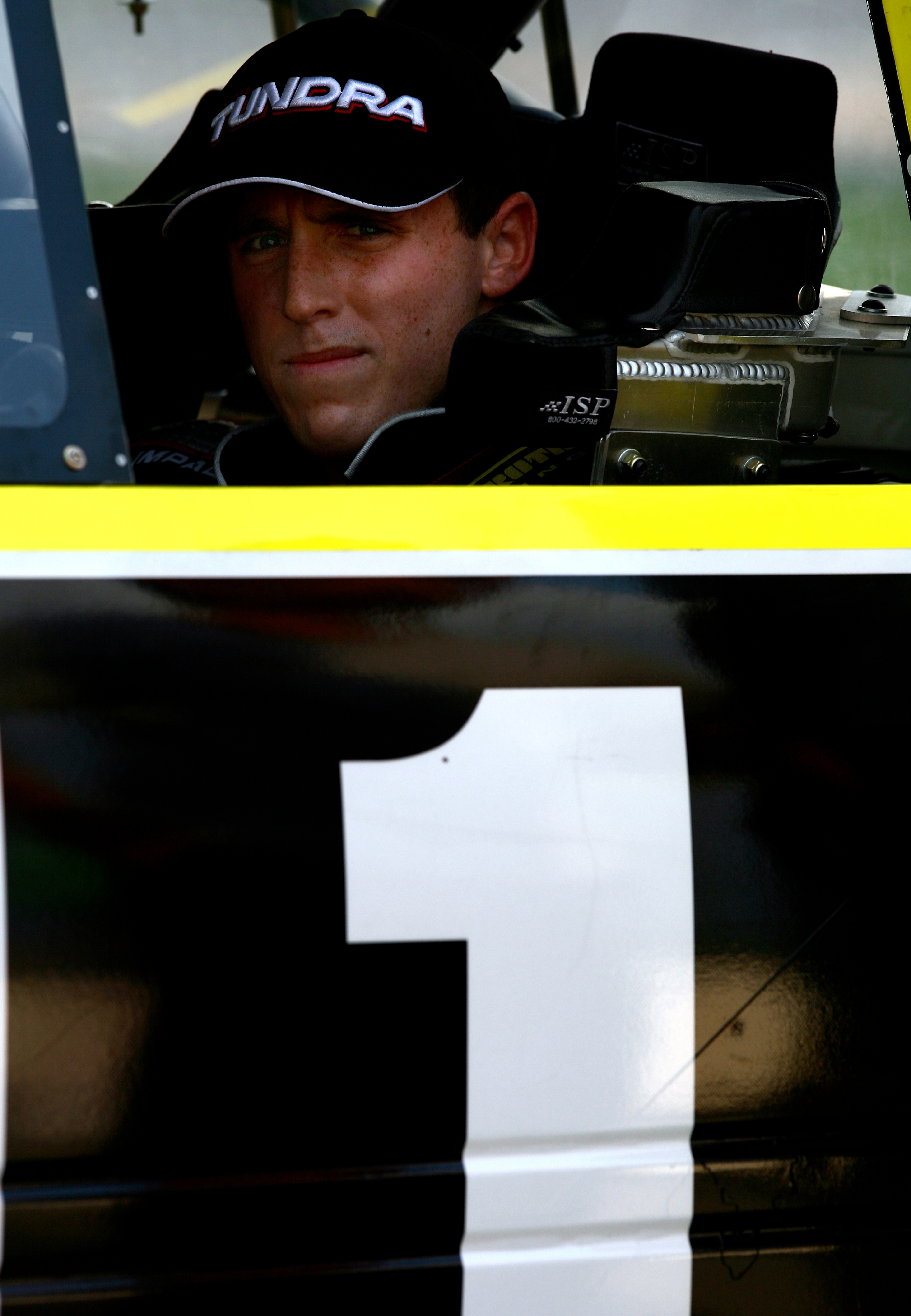 FORT WORTH- JUNE 7: Aaron Fike driver of the #1 RFMS/Red Horse Racing during qualifying for the NASCAR Craftsman Truck Series Sam's Town 400 on June 7, 2007 at Texas Motor Speedway in Fort Worth, Texas. (Photo by Gavin Lawrence/Getty Images) FORT WORTH- JUNE 7: Aaron Fike driver of the #1 RFMS/Red Horse Racing during qualifying for the NASCAR Craftsman Truck Series Sam's Town 400 on June 7, 2007 at Texas Motor Speedway in Fort Worth, Texas. (Photo by Gavin Lawrence/Getty Images)