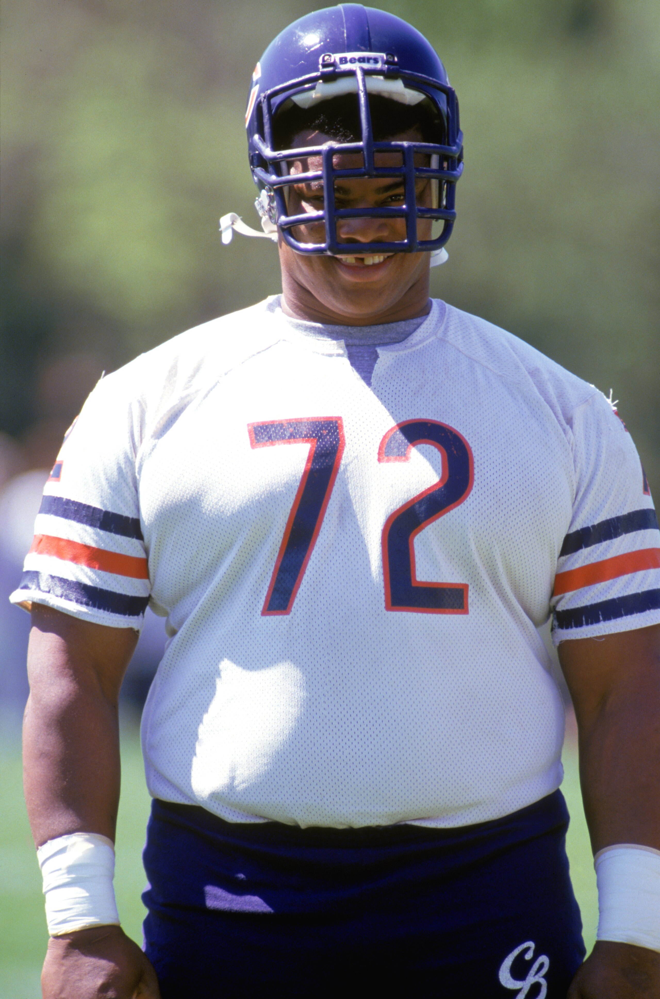 1990:  William Perry #72 of the Chicago Bears looks on during practice in 1990. (Photo by Jonathan Daniel/Getty Images)