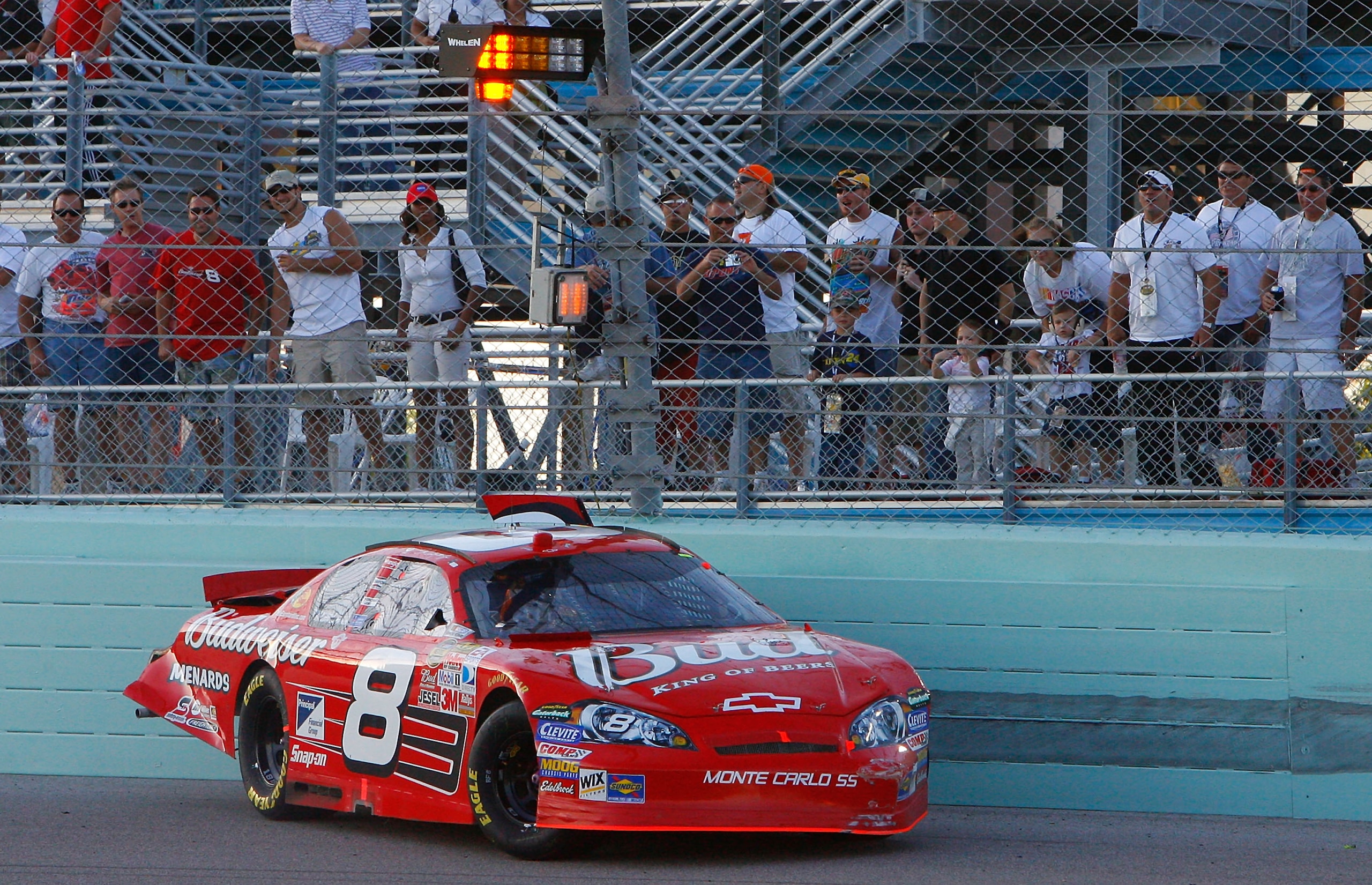 HOMESTEAD, FL - NOVEMBER 18:  Dale Earnhardt Jr., driver of the #8 Budweiser Chevrolet, spins into the wall after crashing during the NASCAR Nextel Cup Series Ford 400 at Homestead-Miami Speedway on November 18, 2007 in Homestead, Florida.  (Photo by Rust