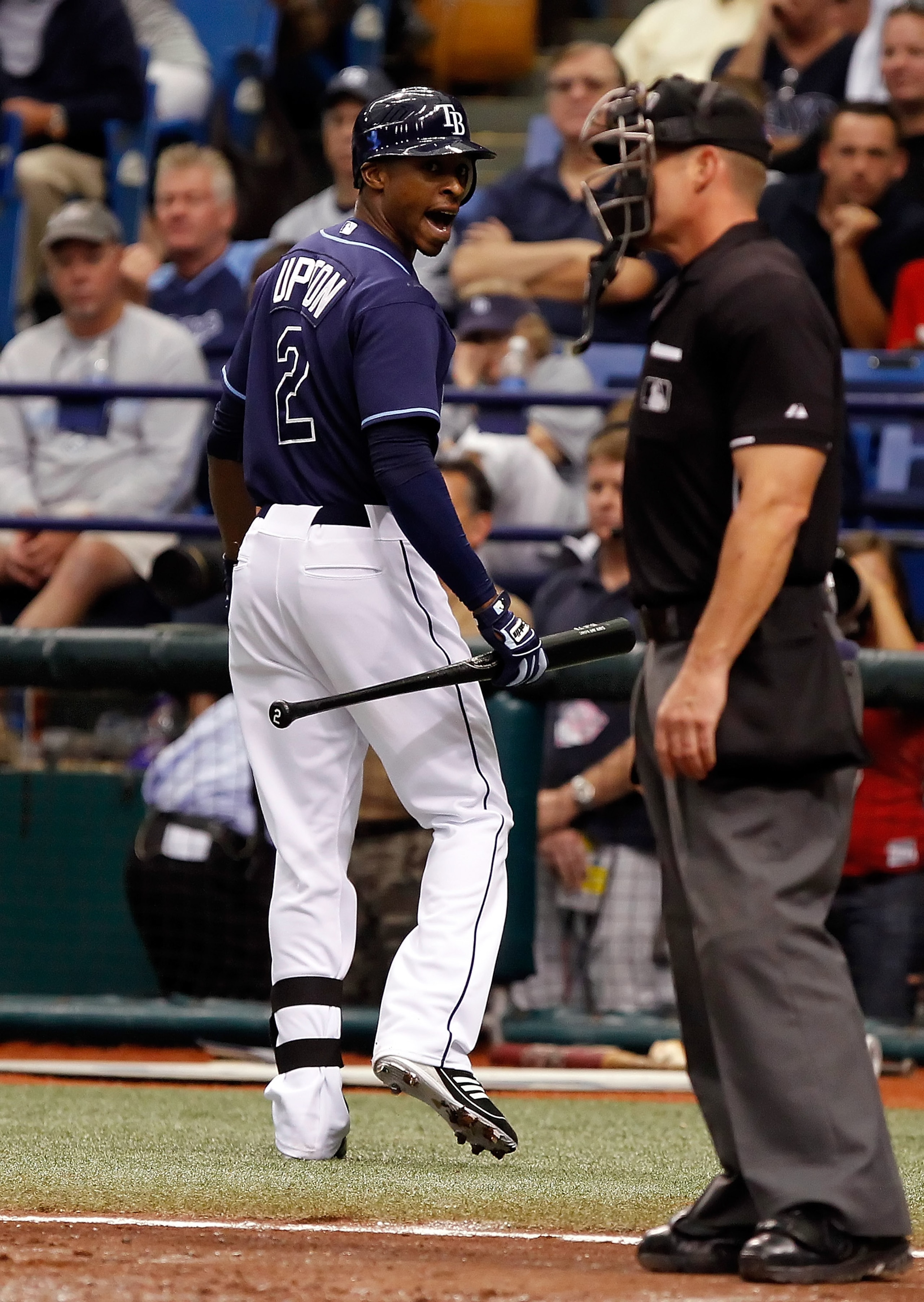 ST. PETERSBURG - OCTOBER 07:  Outfielder B.J. Upton #2 of the Tampa Bay Rays expresses his displeasure after being called out on strikes against the Texas Rangers during Game 2 of the ALDS at Tropicana Field on October 7, 2010 in St. Petersburg, Florida.