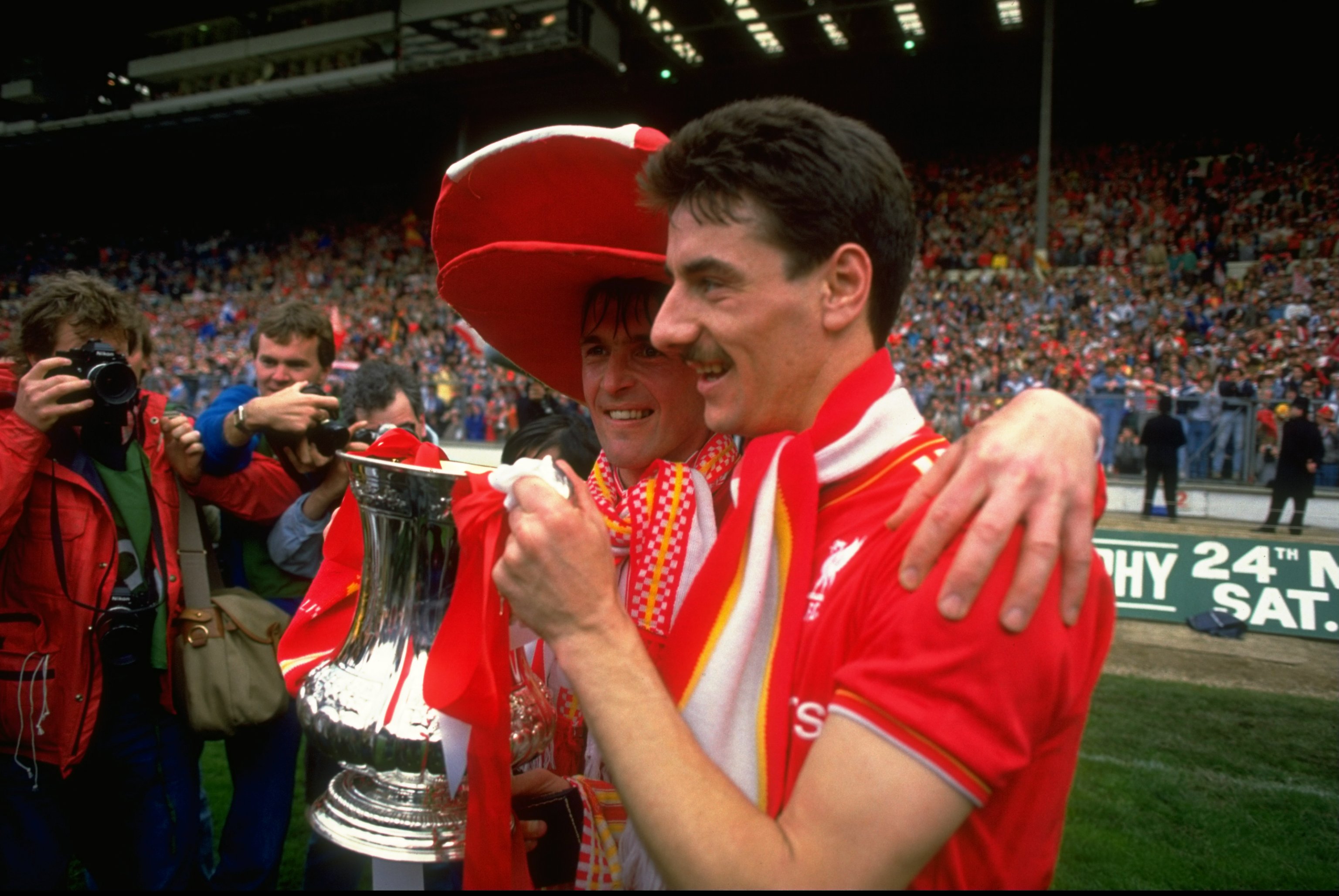 May 1986:  Kenny Dalglish (left) and Ian Rush of Liverpool pose with the trophy after the FA Cup final against Everton at Wembley Stadium in England. Liverpool won the match 3-1. \ Mandatory Credit: David  Cannon/Allsport
