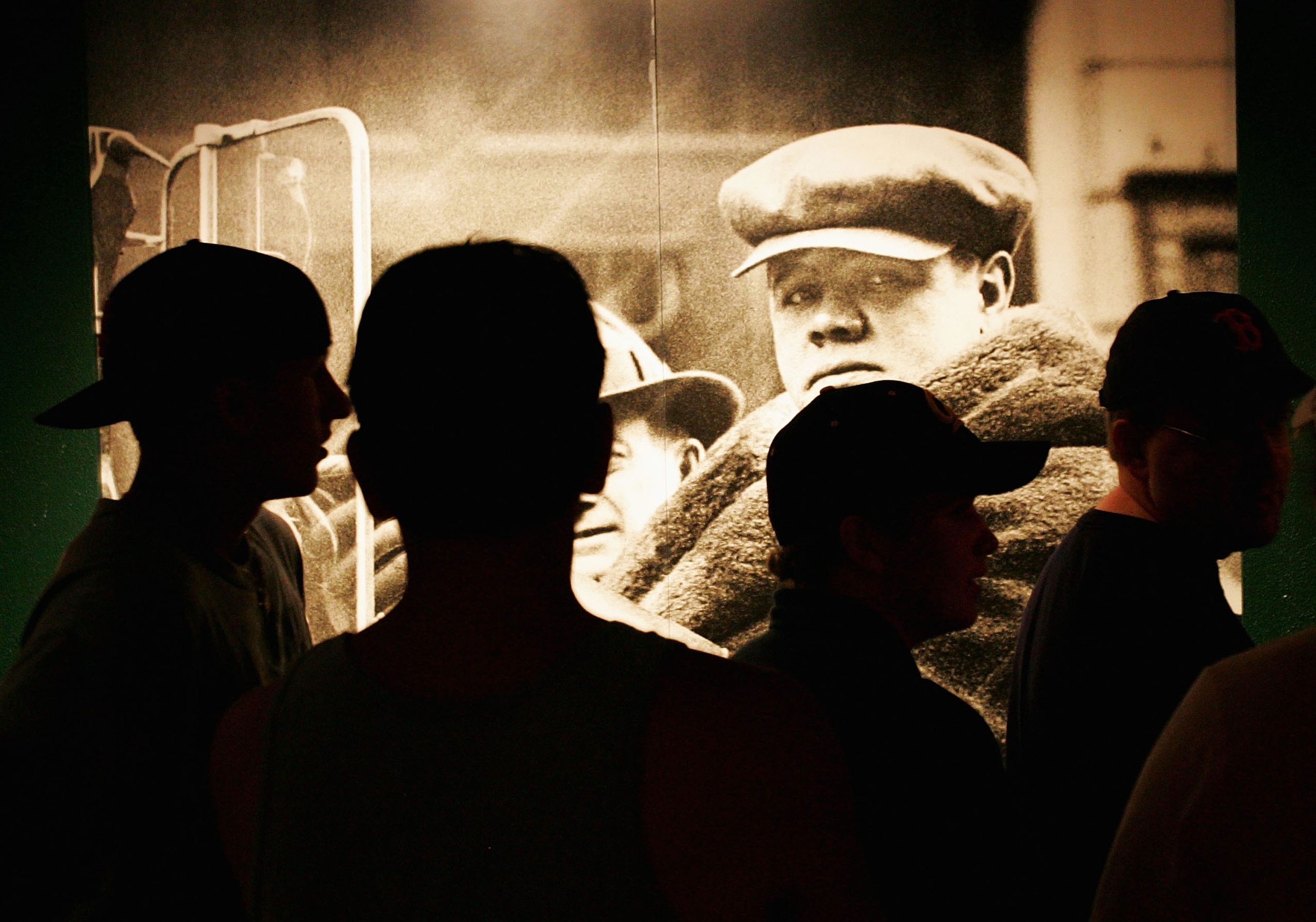 COOPERSTOWN, NY - JULY 30:  People wait in line to see a Babe Ruth exhibit in the National Baseball Hall of Fame and Museum on July 30, 2005 in Cooperstown, New York. (Photo by Ezra Shaw/Getty Images)