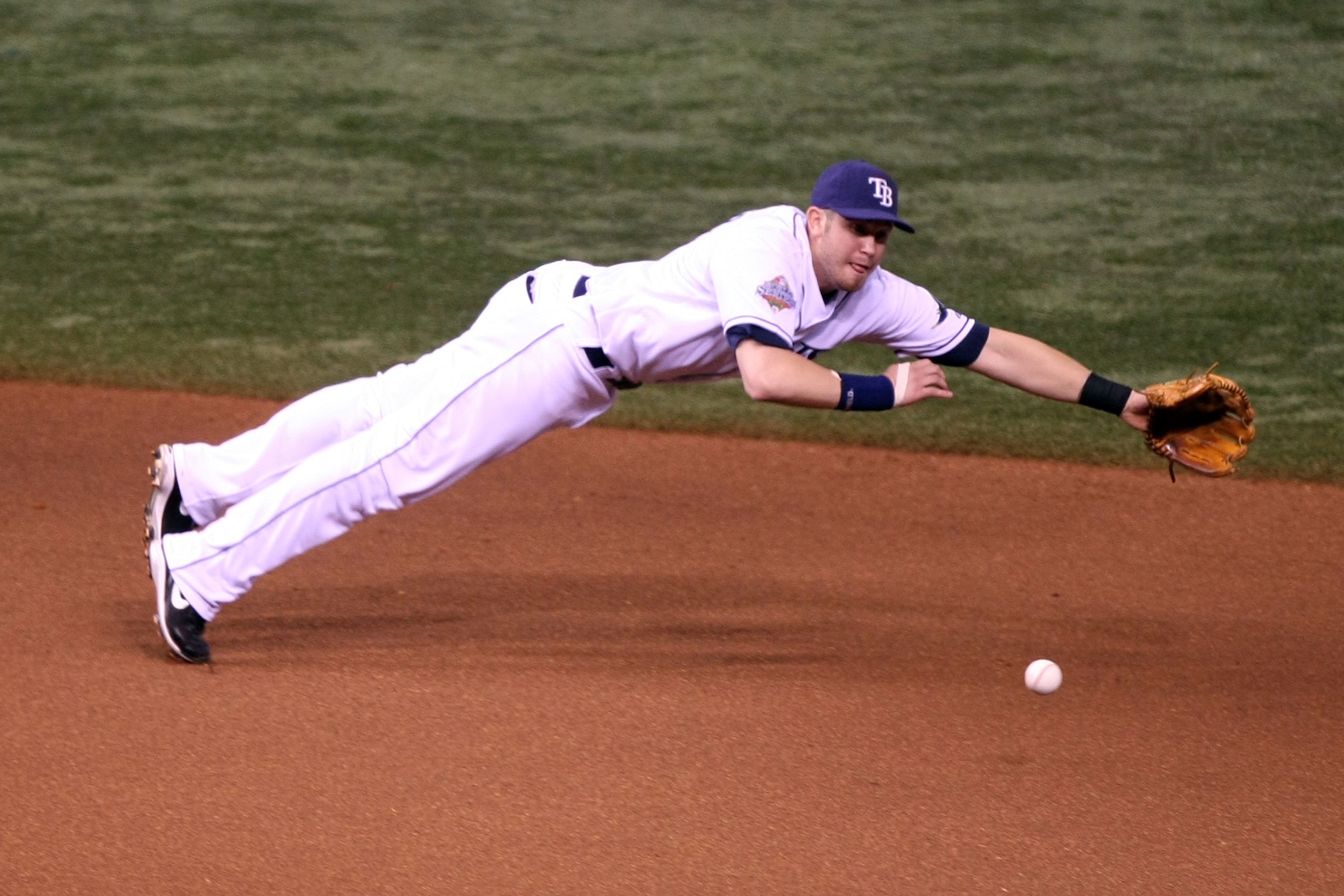 ST PETERSBURG, FL - OCTOBER 22:  Evan Longoria #3 of the Tampa Bay Rays dives for a ball but fails to make the play against the Philadelphia Phillies during game one of the 2008 MLB World Series on October 22, 2008 at Tropicana Field in St. Petersburg, Fl
