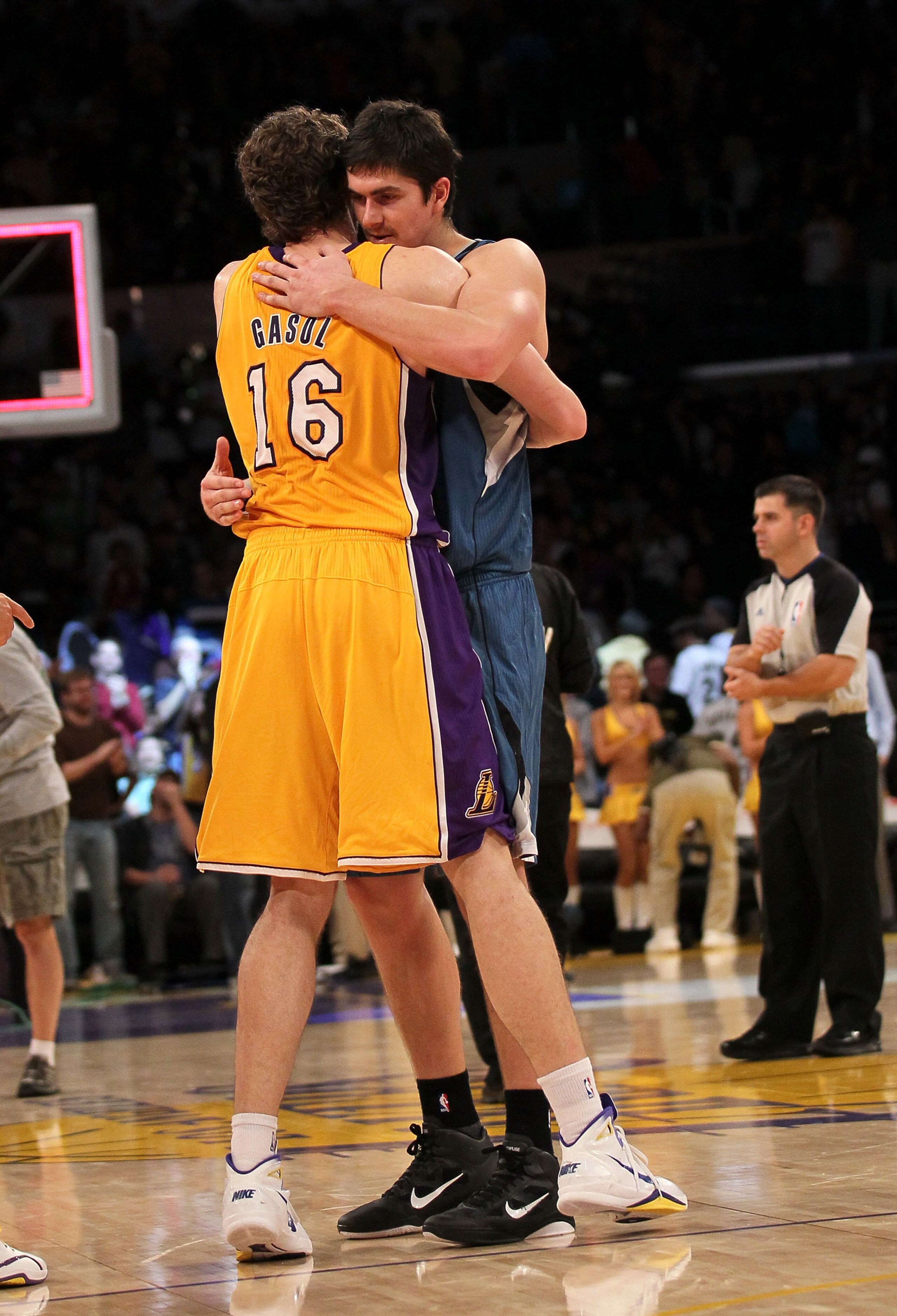 LOS ANGELES, CA - NOVEMBER 09:  Darko Milicic #31 of the Minnesota Timberwolves embraces Pau Gasol #16 of the Los Angeles Lakers after their game at Staples Center on November 9, 2010 in Los Angeles, California.  The Lakers won 99-94.  NOTE TO USER: User