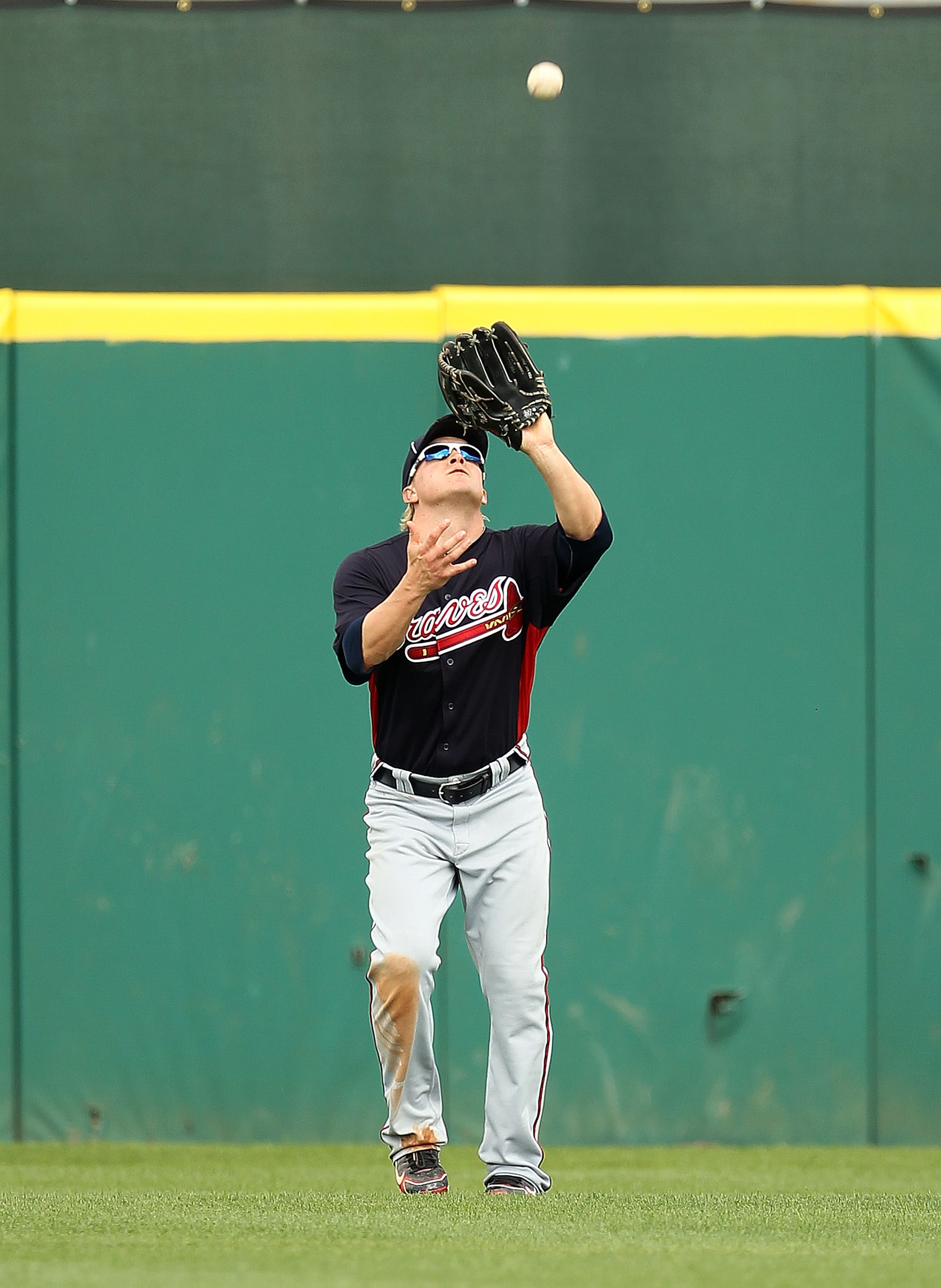 KISSIMMEE, FL - MARCH 01: Nate McLouth #13 of the Atlanta Braves makes a catch during a Spring Training game against the Houston Astros at Osceola County Stadium on March 1, 2011 in Kissimmee, Florida. (Photo by Mike Ehrmann/Getty Images) KISSIMMEE, FL - MARCH 01: Nate McLouth #13 of the Atlanta Braves makes a catch during a Spring Training game against the Houston Astros at Osceola County Stadium on March 1, 2011 in Kissimmee, Florida. (Photo by Mike Ehrmann/Getty Images)