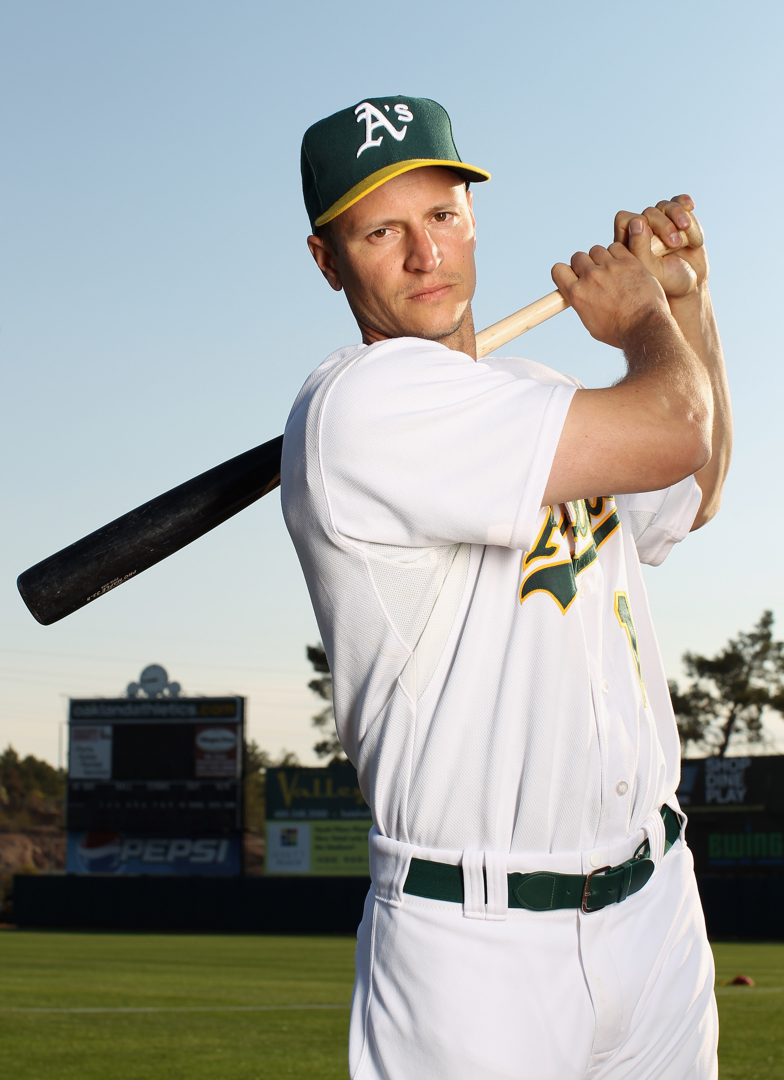 PHOENIX, AZ - FEBRUARY 24: Mark Ellis #14 of the Oakland Athletics poses for a portrait during media photo day at Phoenix Municipal Stadium on February 24, 2011 in Phoenix, Arizona. (Photo by Ezra Shaw/Getty Images) PHOENIX, AZ - FEBRUARY 24: Mark Ellis #14 of the Oakland Athletics poses for a portrait during media photo day at Phoenix Municipal Stadium on February 24, 2011 in Phoenix, Arizona. (Photo by Ezra Shaw/Getty Images)