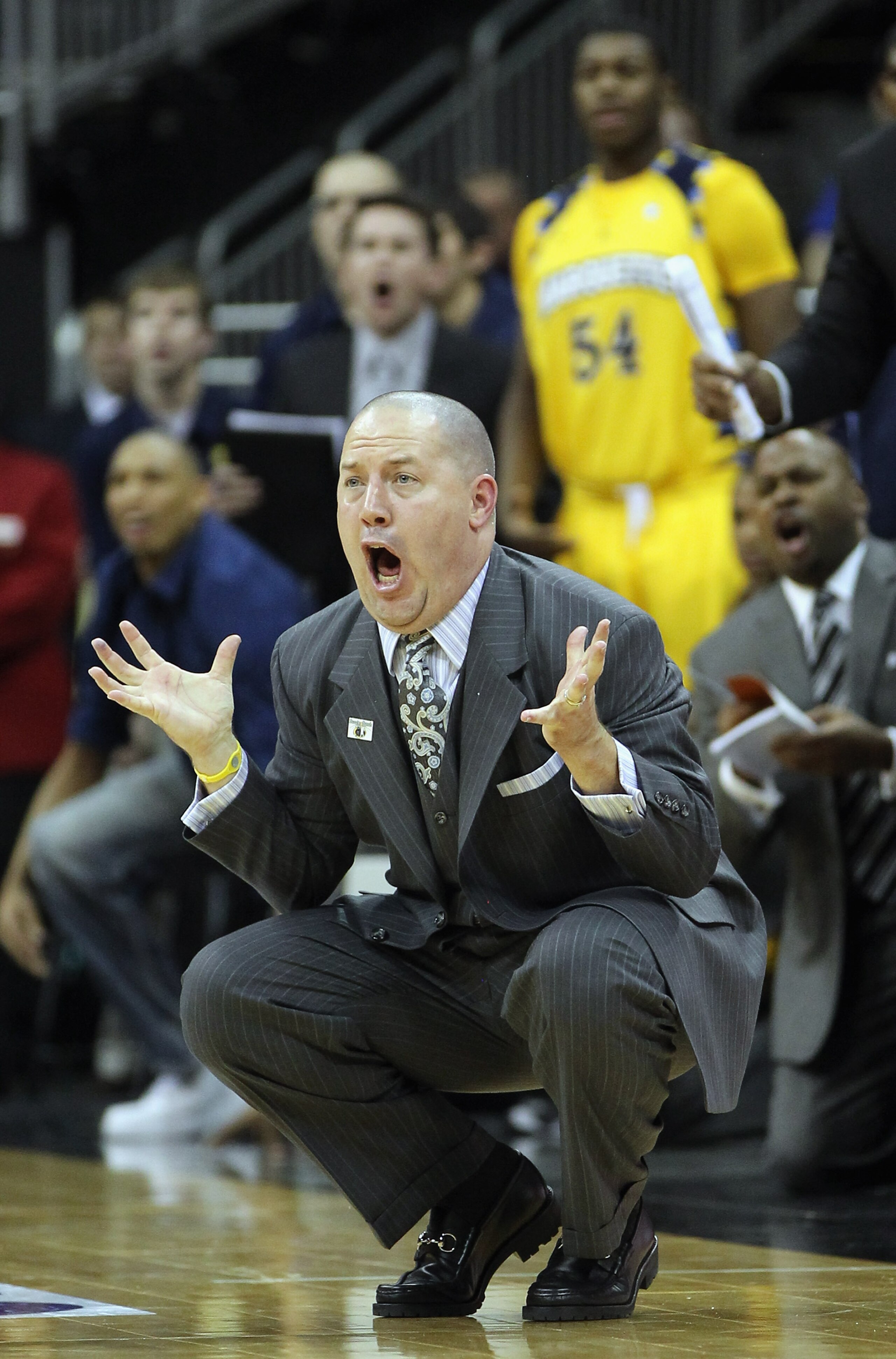 KANSAS CITY, MO - NOVEMBER 23:  Head coach Buzz Williams of the Marquette Golden Eagles reacts to a call during the CBE Classic consolation game against the Gonzaga Bulldogs on November 23, 2010 at the Sprint Center in Kansas City, Missouri.  (Photo by Ja