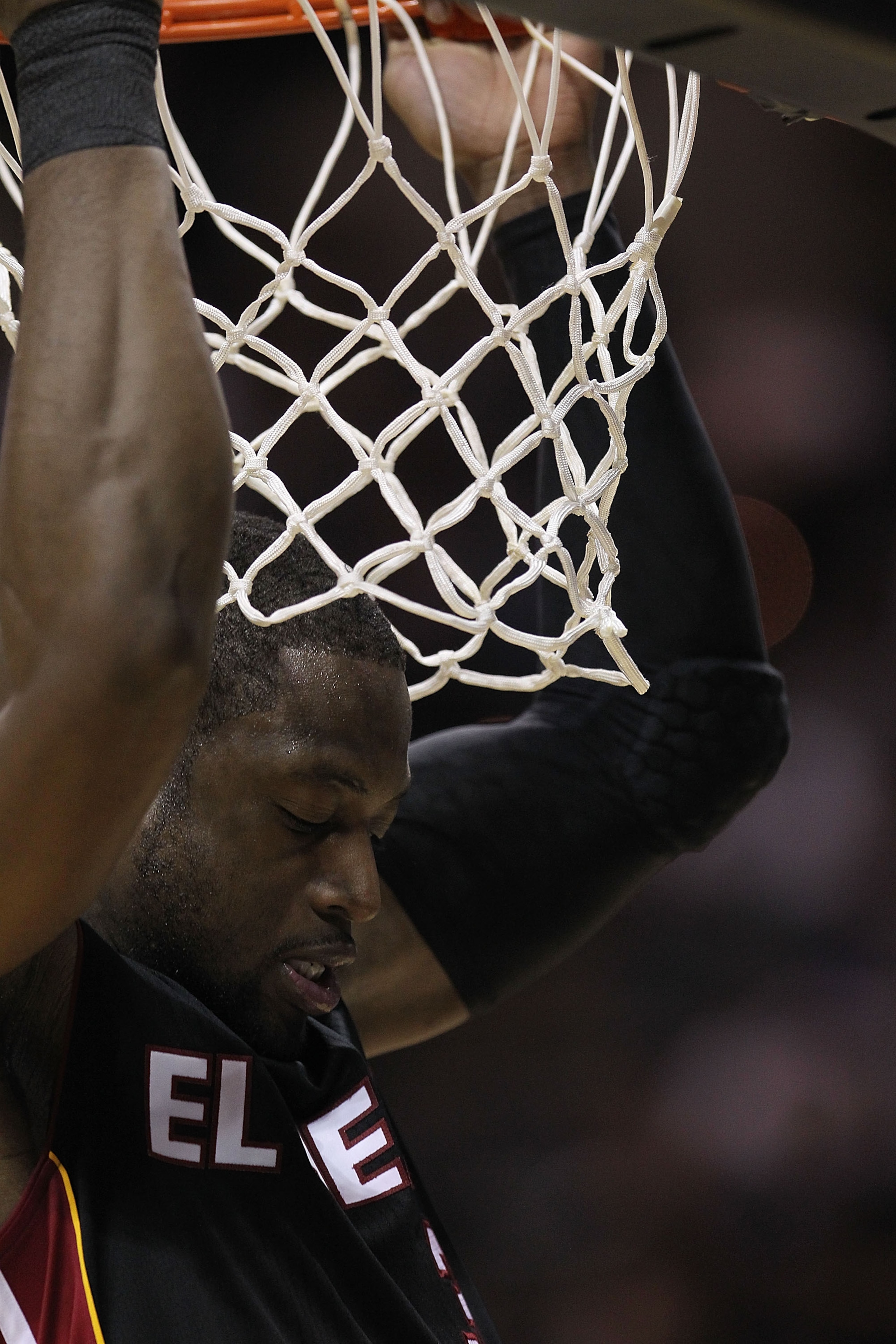 SAN ANTONIO, TX - MARCH 04: Guard Dwyane Wade #3 of the Miami Heat hangs on the rim before a game against the San Antonio Spurs at AT&T Center on March 4, 2011 in San Antonio, Texas. NOTE TO USER: User expressly acknowledges and agrees that, by downloa SAN ANTONIO, TX - MARCH 04: Guard Dwyane Wade #3 of the Miami Heat hangs on the rim before a game against the San Antonio Spurs at AT&T Center on March 4, 2011 in San Antonio, Texas. NOTE TO USER: User expressly acknowledges and agrees that, by downloa