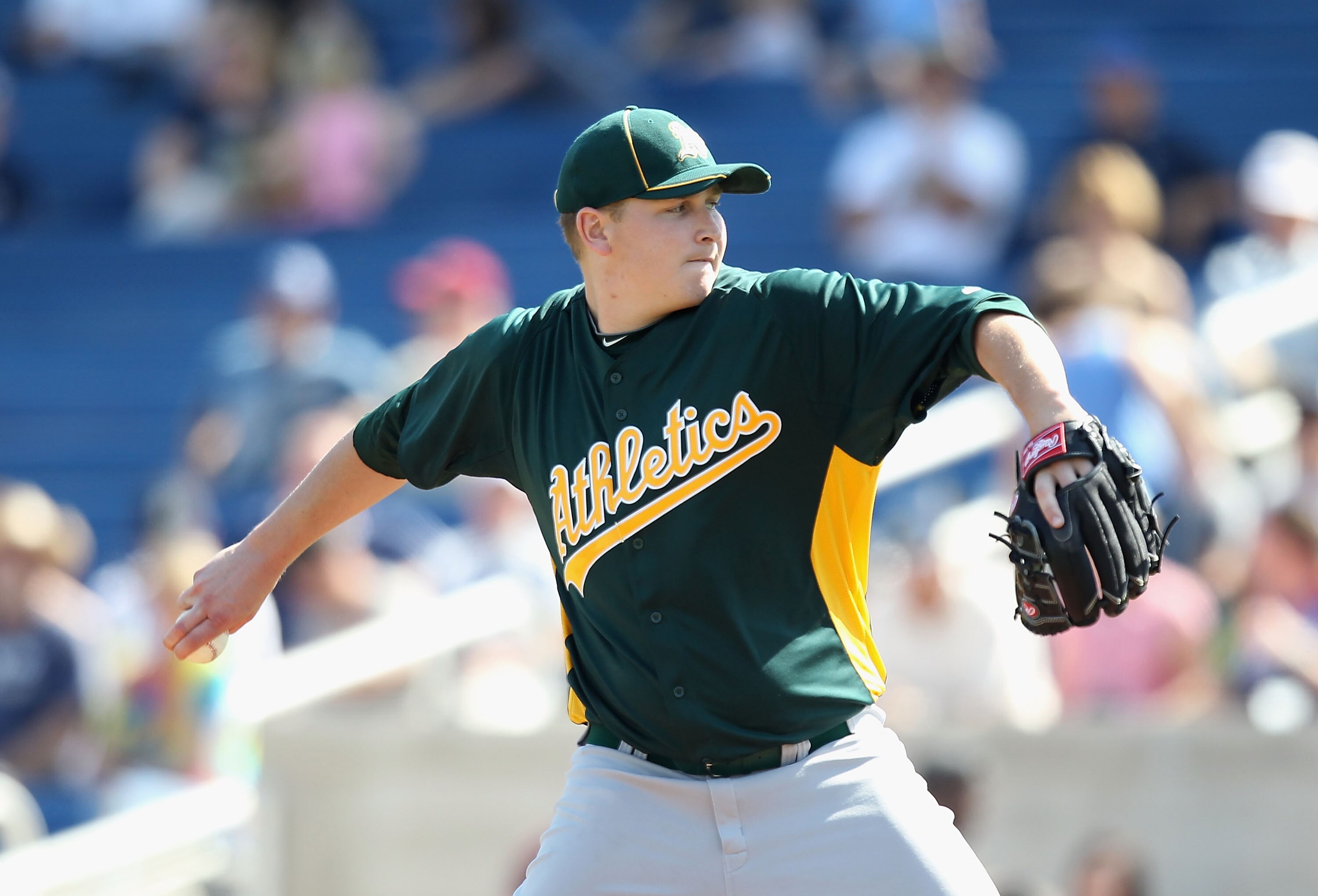 PHOENIX, AZ - MARCH 03:  Starting pitcher Trevor Cahill #53 of the Oakland Athletics pitches against the Milwaukee Brewers during the spring training game at Maryvale Baseball Park on March 3, 2011 in Phoenix, Arizona.  (Photo by Christian Petersen/Getty 