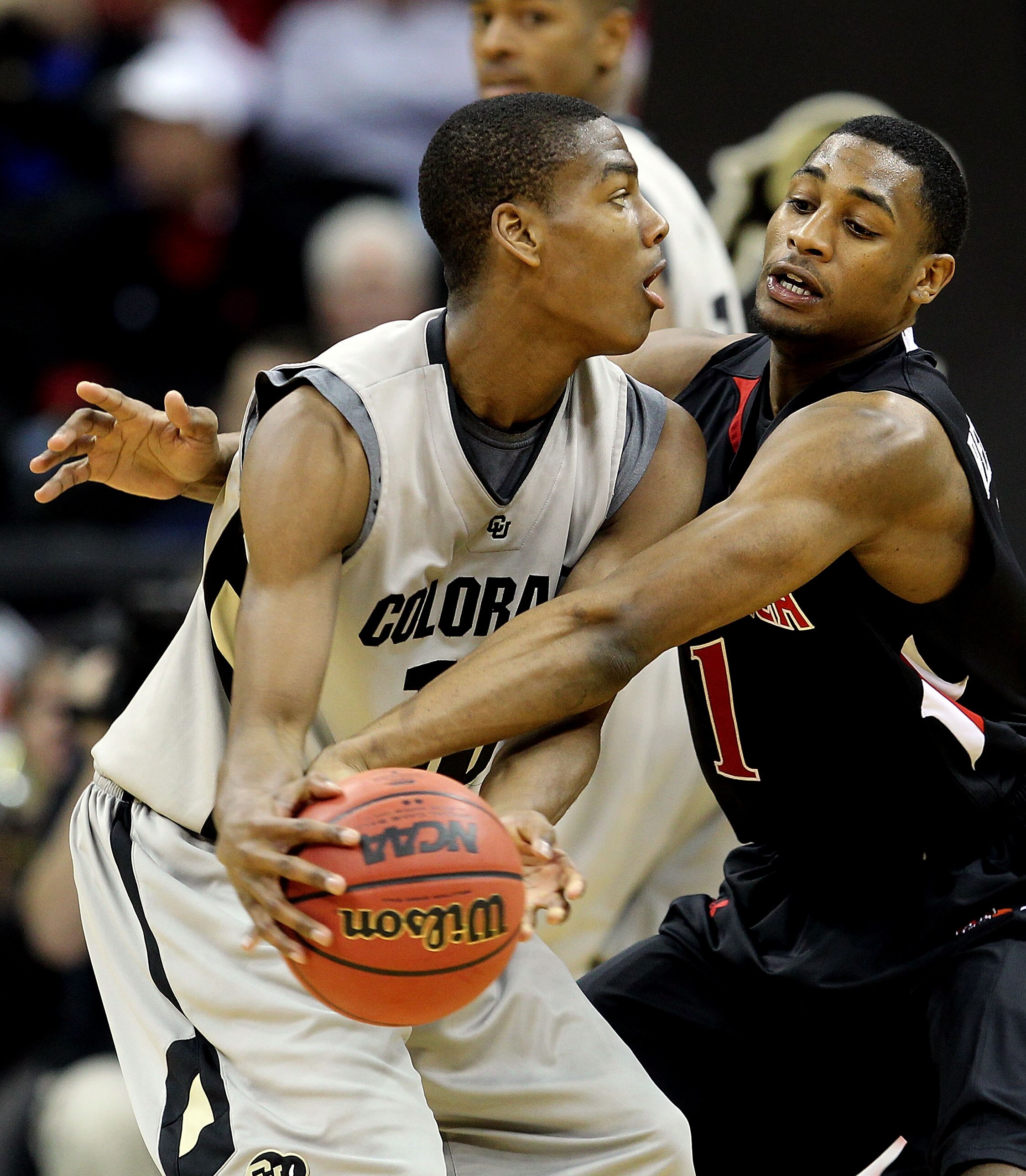 KANSAS CITY, MO - MARCH 10:  Alec Burks #10 of the Colorado Buffaloes is gaurded by Brad Reese #1 of the Texas Tech Red Raiders in the second half during the first round game of the 2010 Phillips 66 Big 12 Men's Basketball Tournament at the Sprint Center