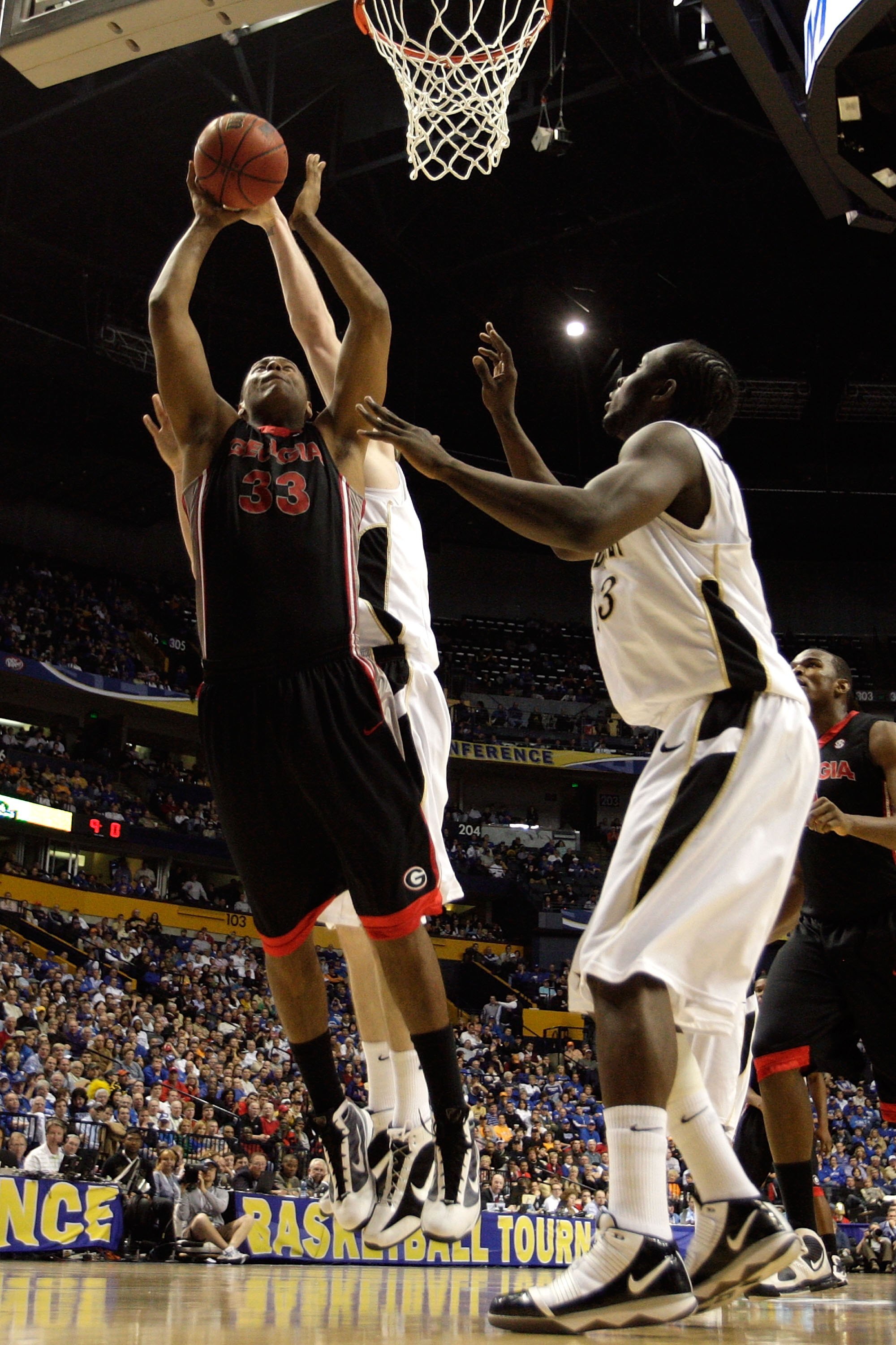 NASHVILLE, TN - MARCH 12:  Trey Thompkins #33 of the Georgia Bulldogs goes up for a shot attempt the Vanderbilt Commodores during the quarterfinals of the SEC Men's Basketball Tournament at the Bridgestone Arena on March 12, 2010 in Nashville, Tennessee. 