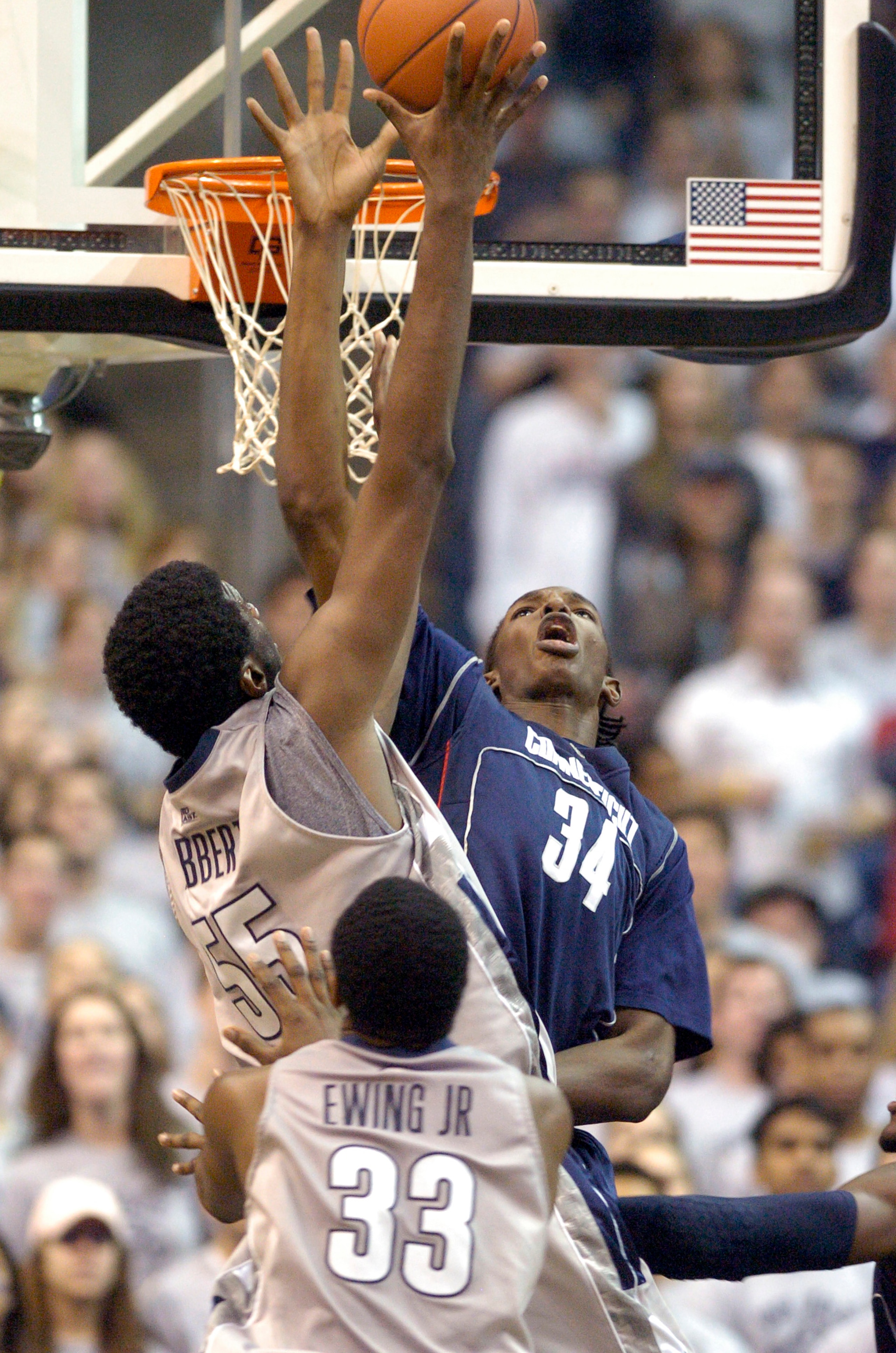 WASHINGTON - JANUARY 12: Hasheen Thabeet #34 of the University of Connecticut blocks a shot by Roy Hibbert #55 of the Georgetown Hoyas at the Verizon Center on January 12, 2008 in Washington, D.C. (Photo by Greg Fiume/Getty Images) WASHINGTON - JANUARY 12: Hasheen Thabeet #34 of the University of Connecticut blocks a shot by Roy Hibbert #55 of the Georgetown Hoyas at the Verizon Center on January 12, 2008 in Washington, D.C. (Photo by Greg Fiume/Getty Images)