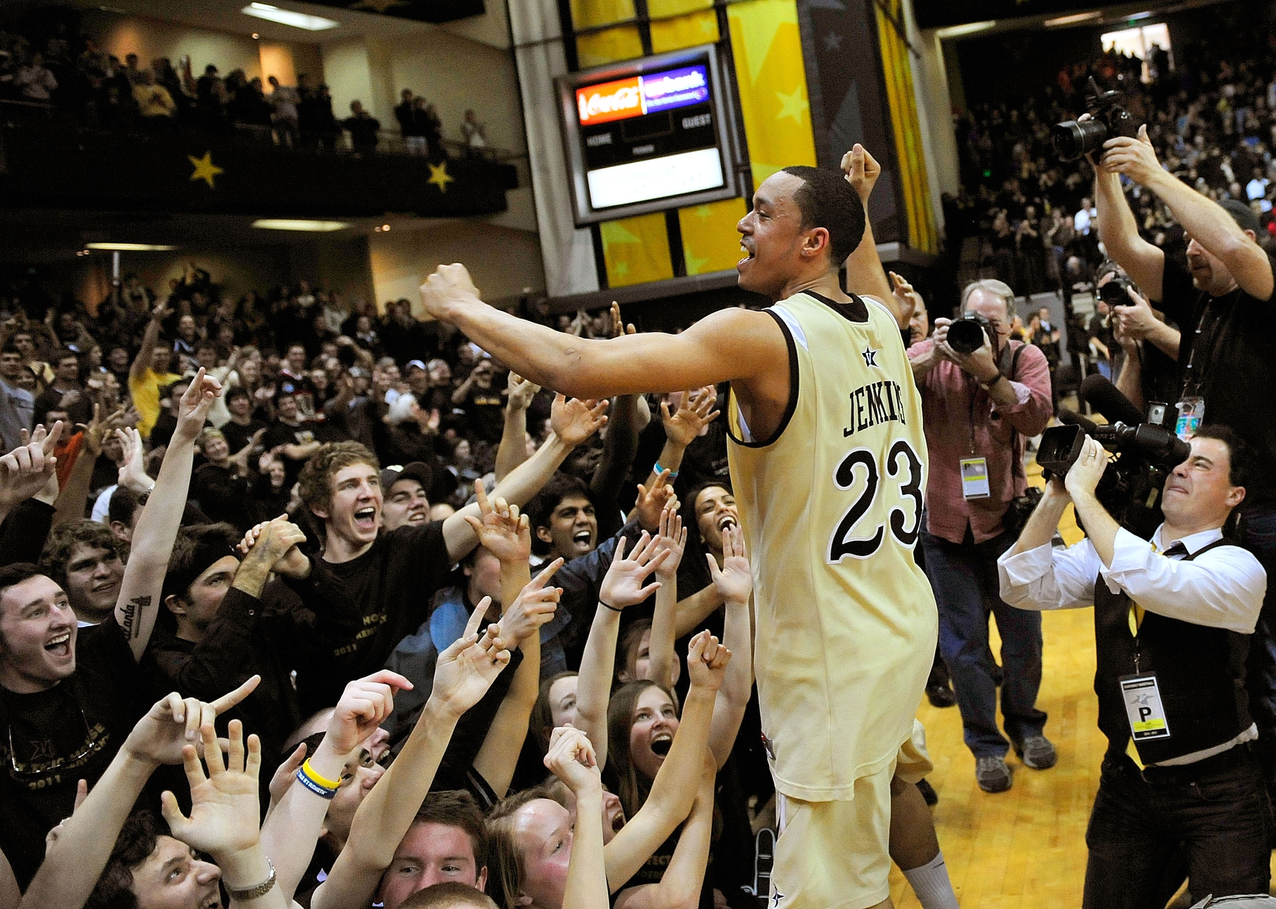 NASHVILLE, TN - FEBRUARY 12:  John Jenkins #23 of the Vanderbilt Commodores celebrates with fans after a win over the Kentucky Wildcats at Memorial Gym on February 12, 2011 in Nashville, Tennessee. Vanderbilt won 81-77.  (Photo by Grant Halverson/Getty Im
