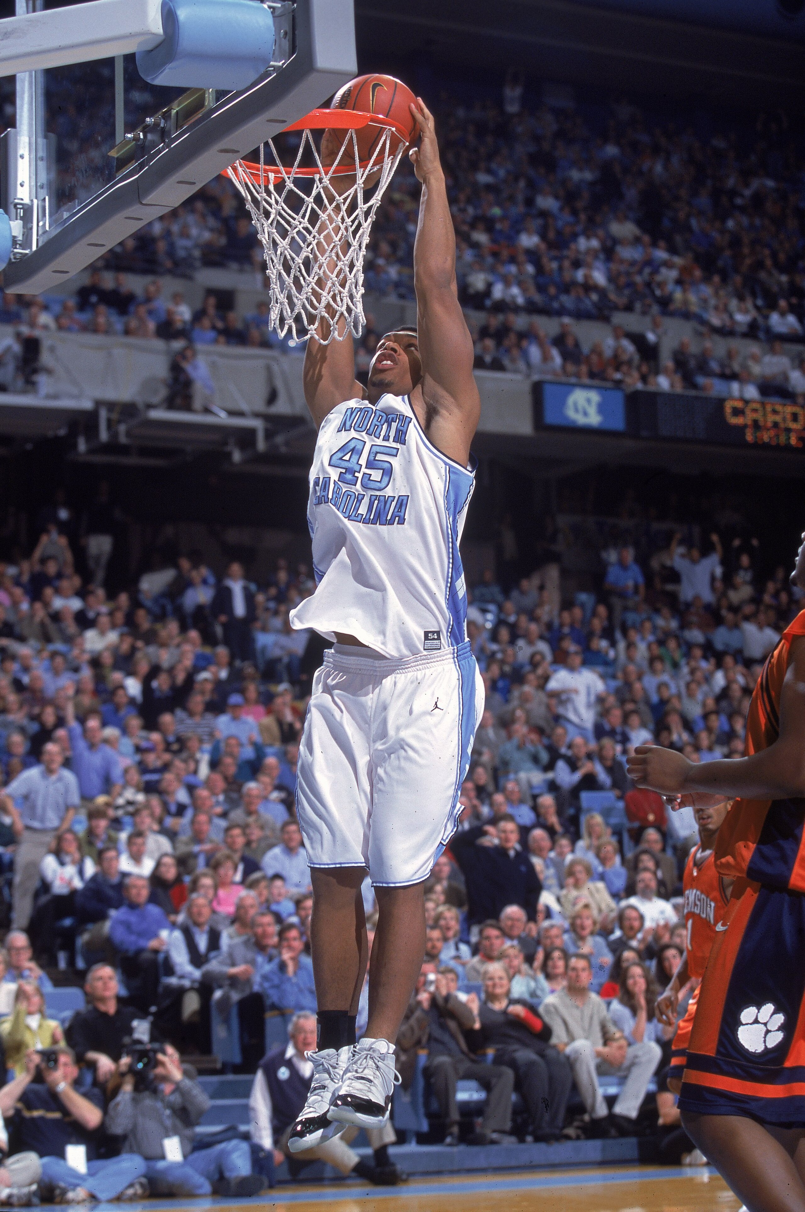 17 Jan 2001:  Julius Peppers #45 of the University of North Carolina Tar Heels jumps up to slam the ball during the game against the Clemson Tigers at the Dean E. Smith Center in Chapel Hill, North Carolina.  The Tar Heels defeated the Tigers 92-65. Manda