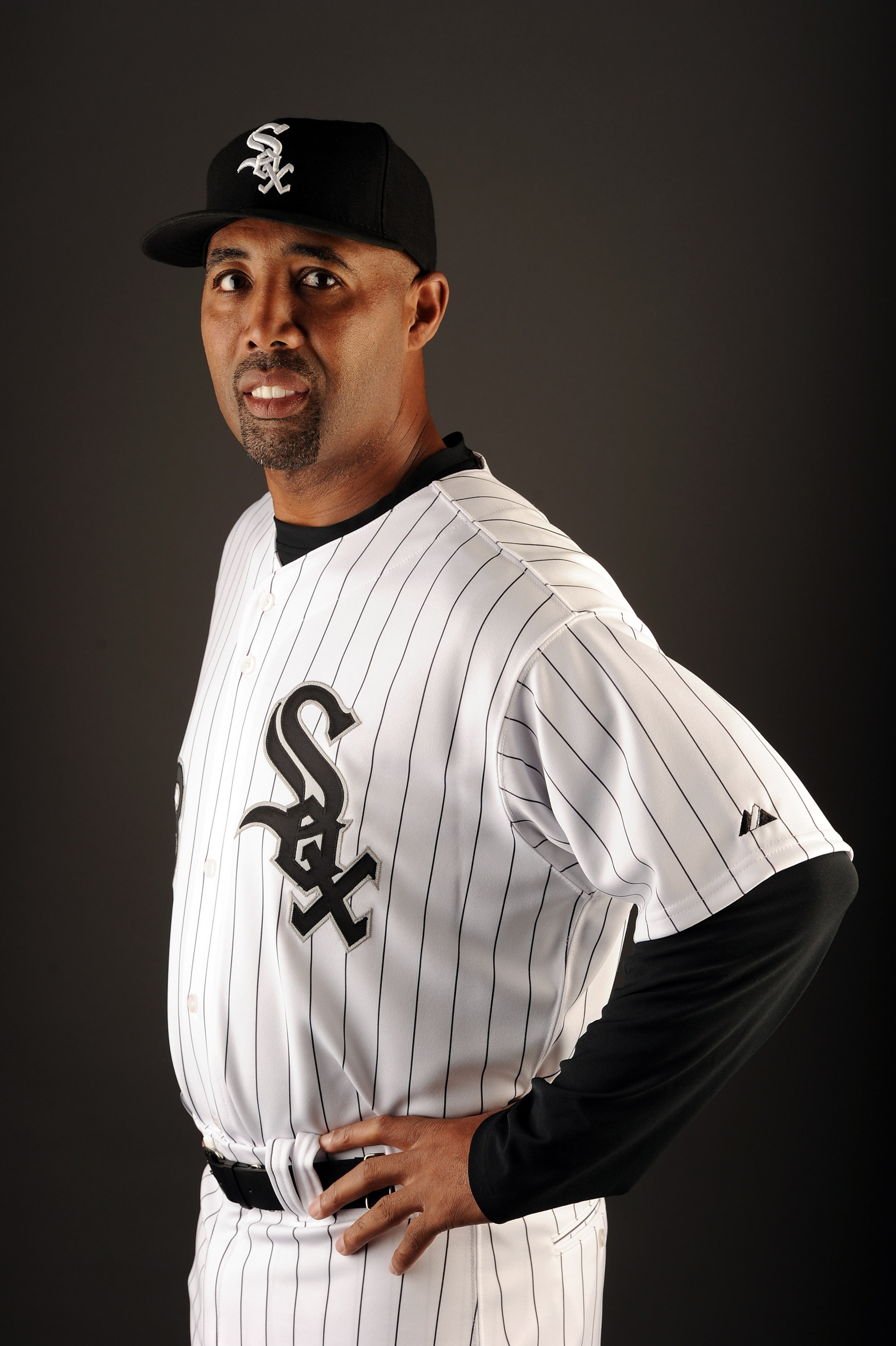 GLENDALE, AZ - FEBRUARY 26:  First Base Coach Harold Baines #3 of the Chicago White Sox poses for a photo on photo day at Camelback Ranch on February 26, 2011 in Glendale, Arizona.  (Photo by Harry How/Getty Images)