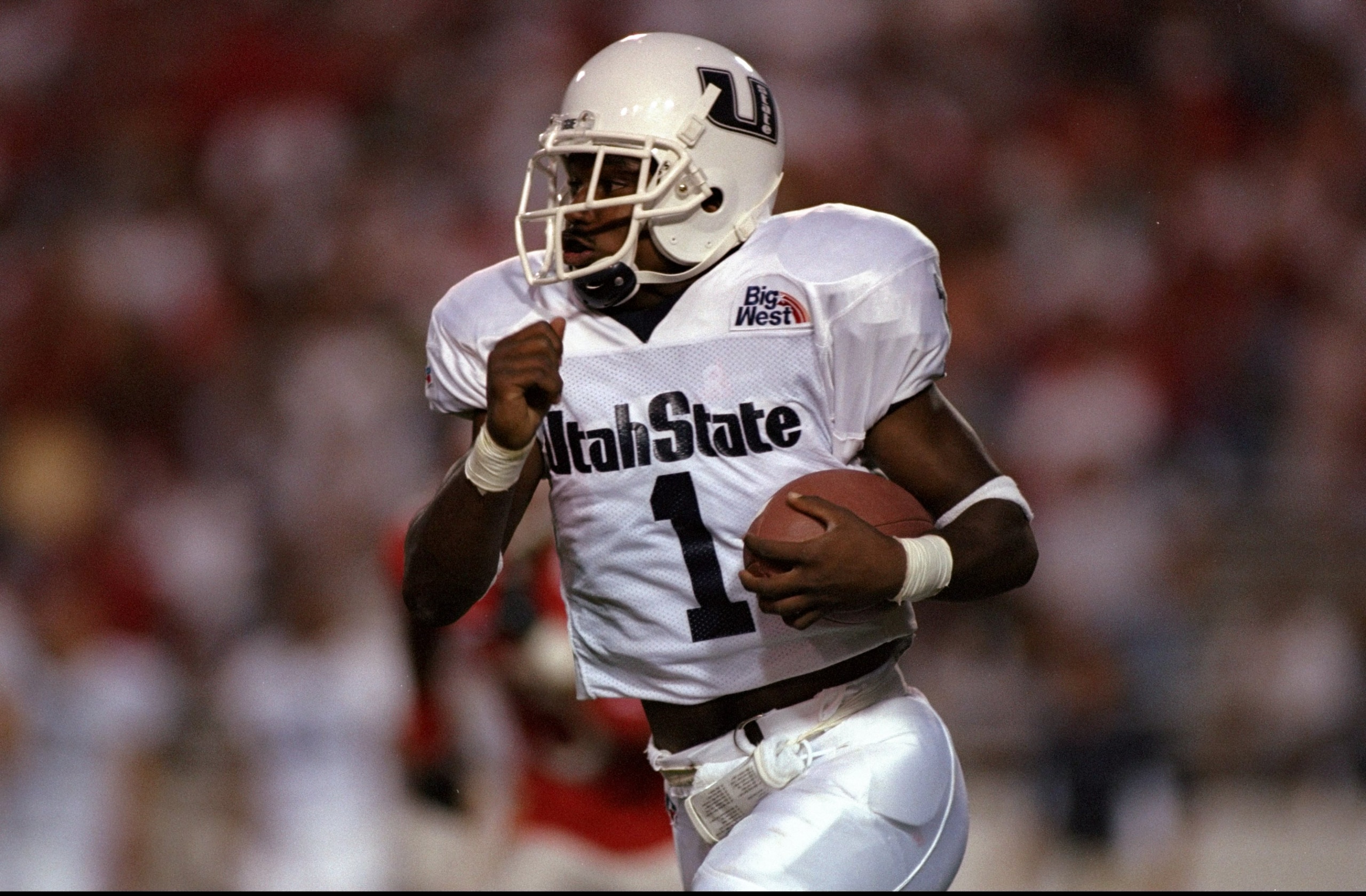 12 Sep 1998:  Tony Walker #1 of the Utah State Aggies in action during the game against the New Mexico Lobos at the University Stadium in Albuquerque, New Mexico. The Lobos defeated the Aggies 39-36.