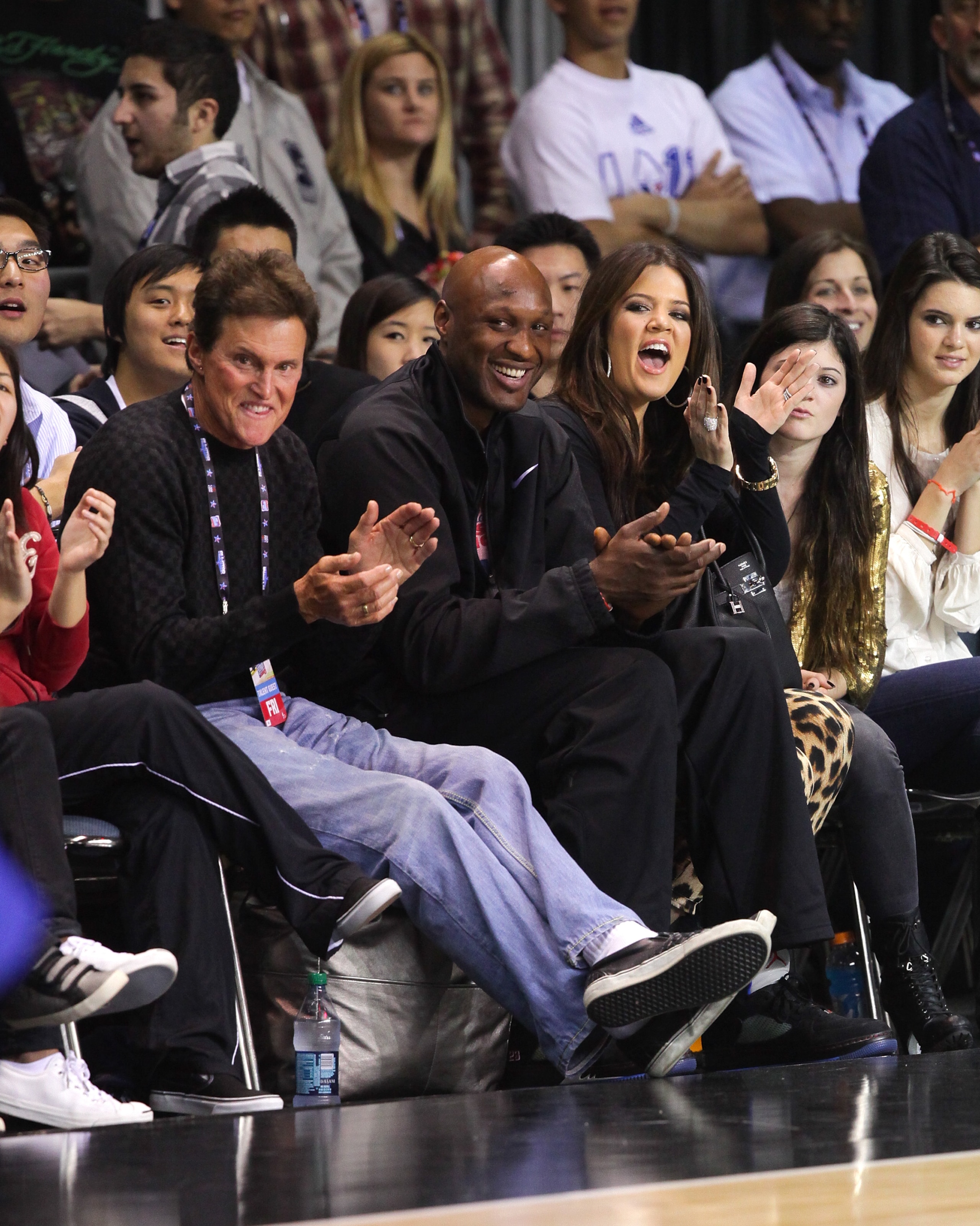 LOS ANGELES, CA - FEBRUARY 18:  (L-R) Bruce Jenner, Lamar Odom and Khloe Kardashian play at the 2011 BBVA NBA All-Star Celebrity Game at the Los Angeles Convention Center on February 18, 2011 in Los Angeles, California.  (Photo by Noel Vasquez/Getty Image