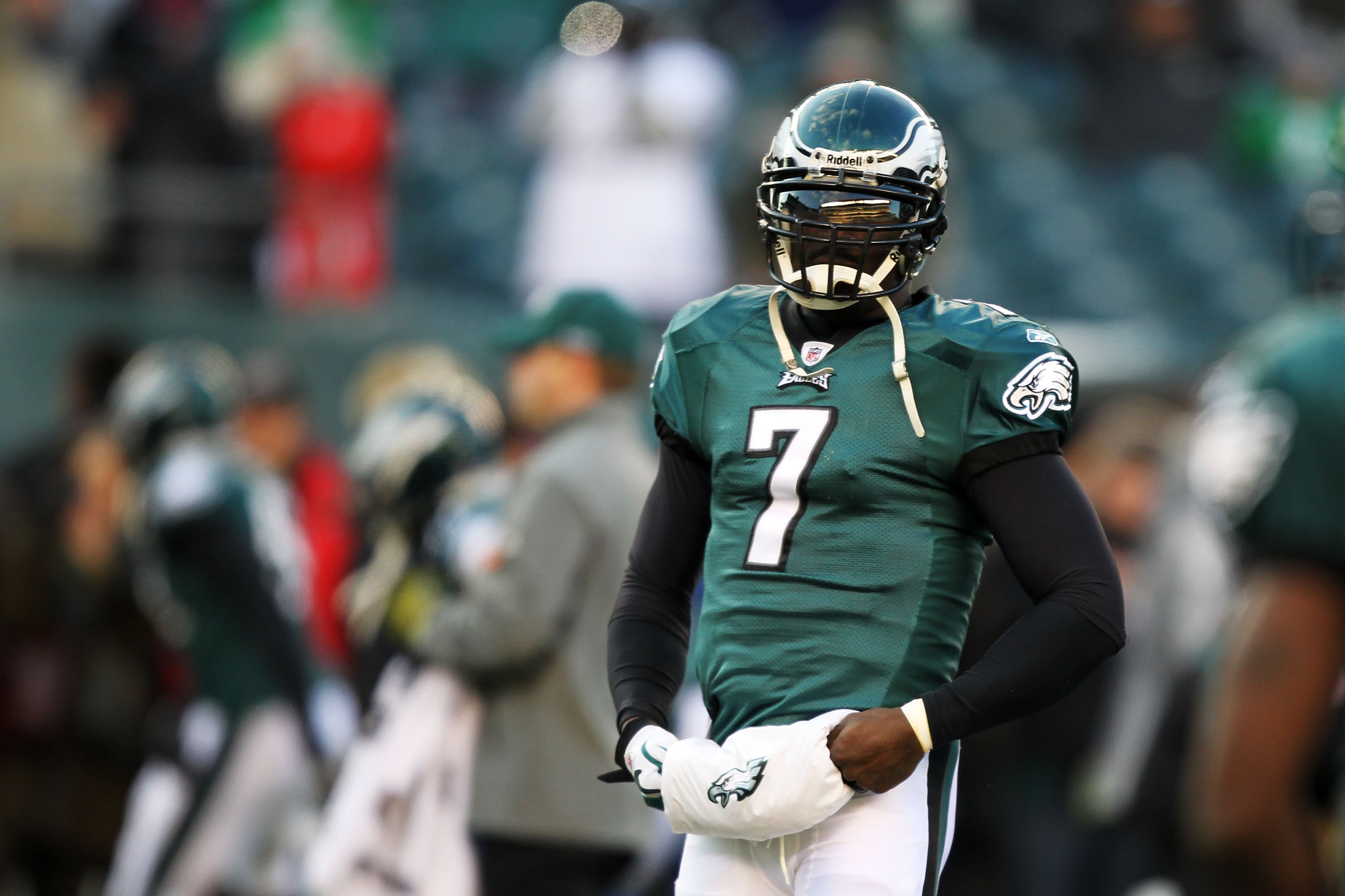 Philadelphia Eagles backup quarterback Michael Vick #7 walks to