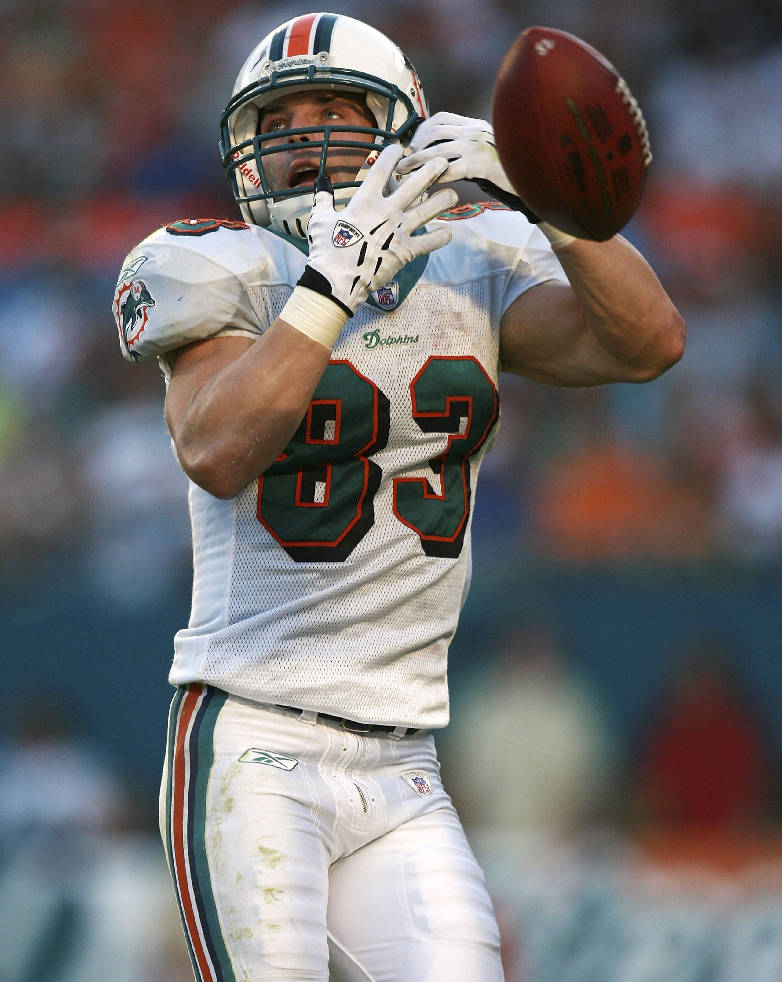 MIAMI - DECEMBER 03:  Wide receiver Wes Welker #83 of the Miami Dolphins flubs a kick-off in the second quarter against the Jacksonville Jaguars at Dolphin Stadium on December 3, 2006 in Miami, Florida.  (Photo by Doug Benc/Getty Images)