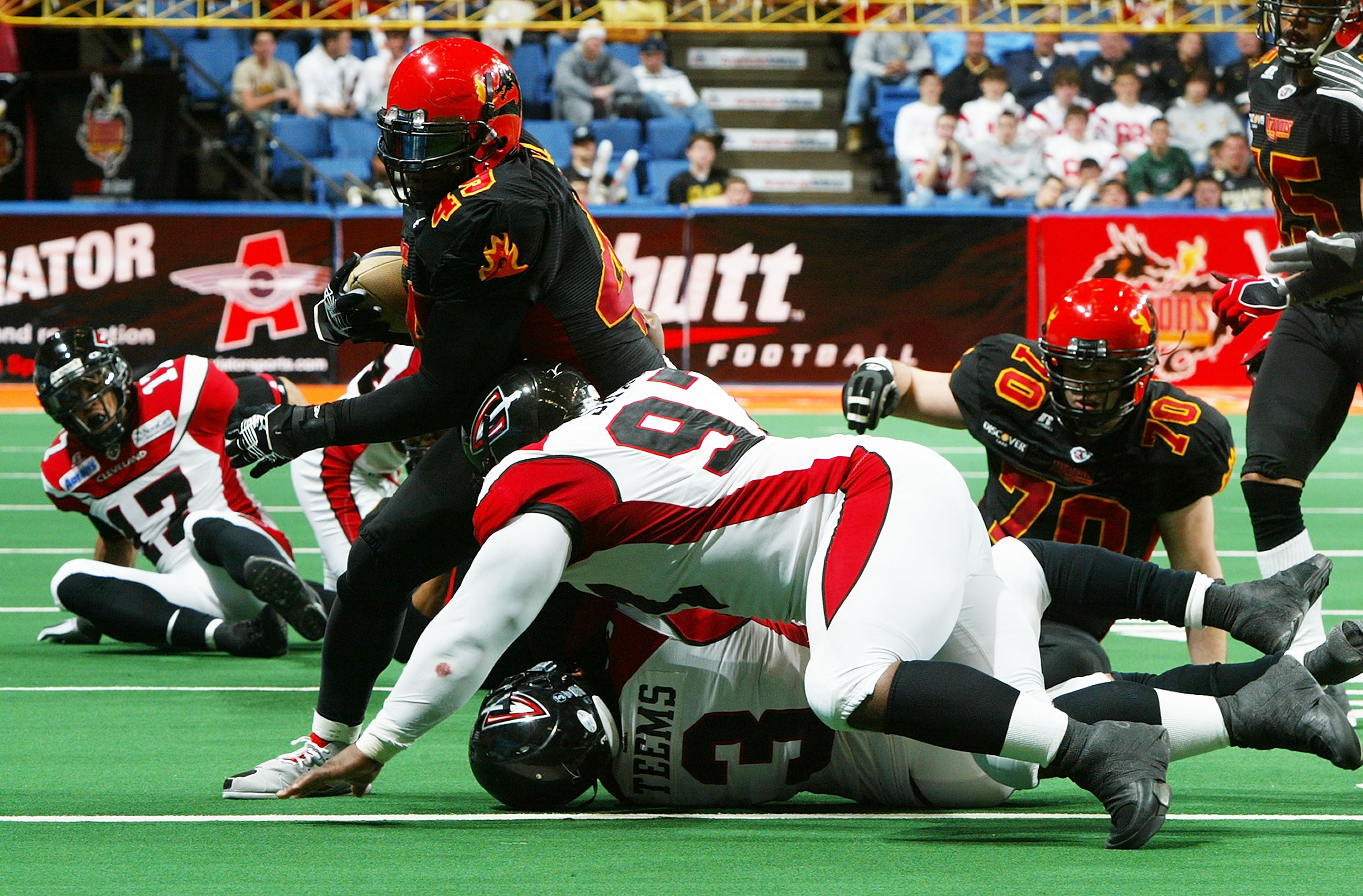 UNIONDALE, NY - APRIL 26: Ricky Hall #49 of the New York Dragons runs the ball against the Cleveland Gladiators on April 26, 2008 at Nassau Coliseum in Uniondale, New York. Dragons defeat Gladiators 56-39. (Photo by Mike Stobe/Getty Images for the New