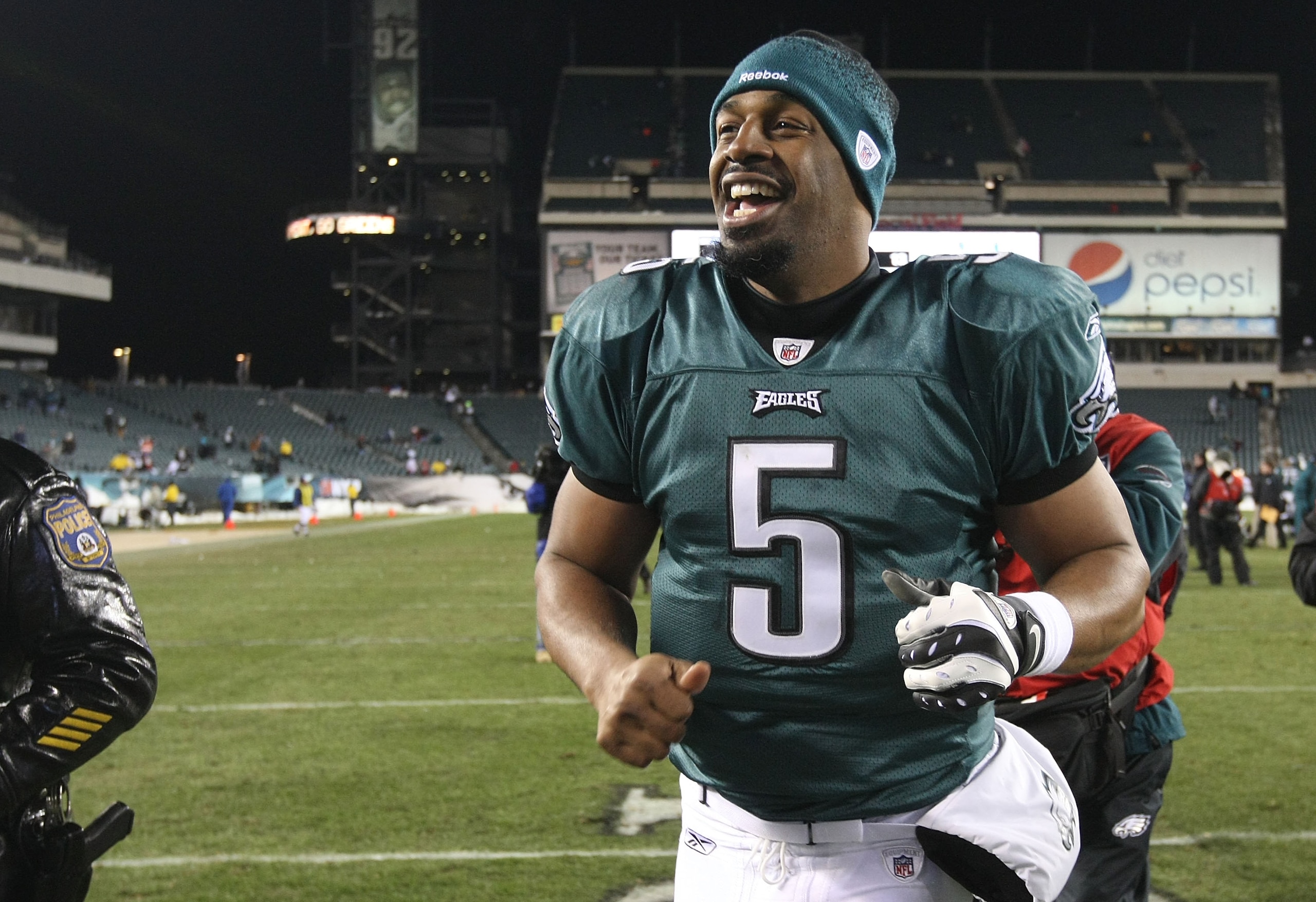 PHILADELPHIA - DECEMBER 20:  Donovan McNabb #5 of the Philadelphia Eagles runs from the field after defeating the San Francisco 49ers at Lincoln Financial Field on December 20, 2009 in Philadelphia, Pennsylvania.  (Photo by Nick Laham/Getty Images)