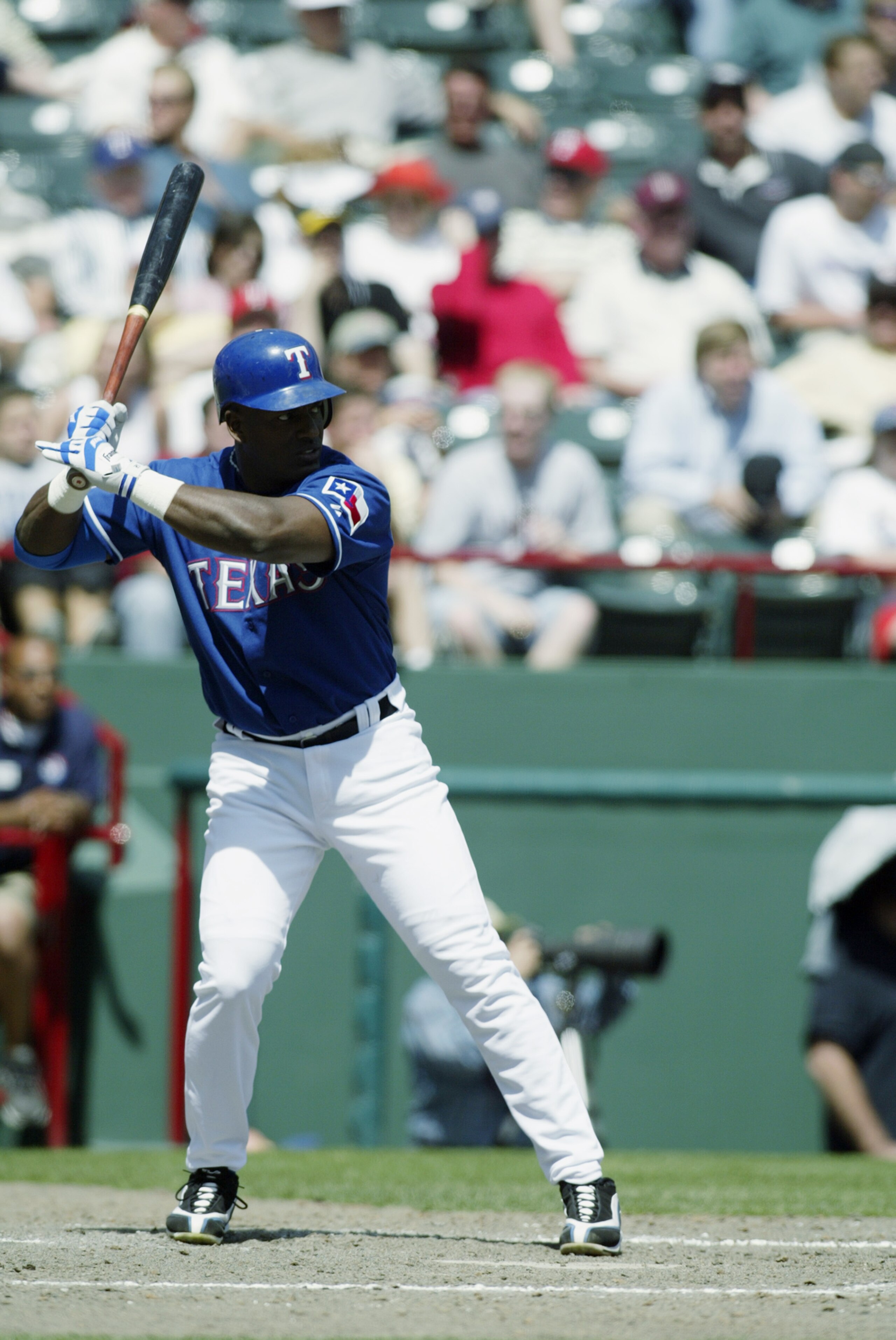 ARLINGTON, TX - APRIL 10:  Ruben Sierra #21 of the Texas Rangers stands at bat during the game against the Oakland Athletics at the Ballpark in Arlington on April 10, 2003 in Arlington, Texas.  The Rangers defeated the A's 5-4.  (Photo by Ronald Martinez/