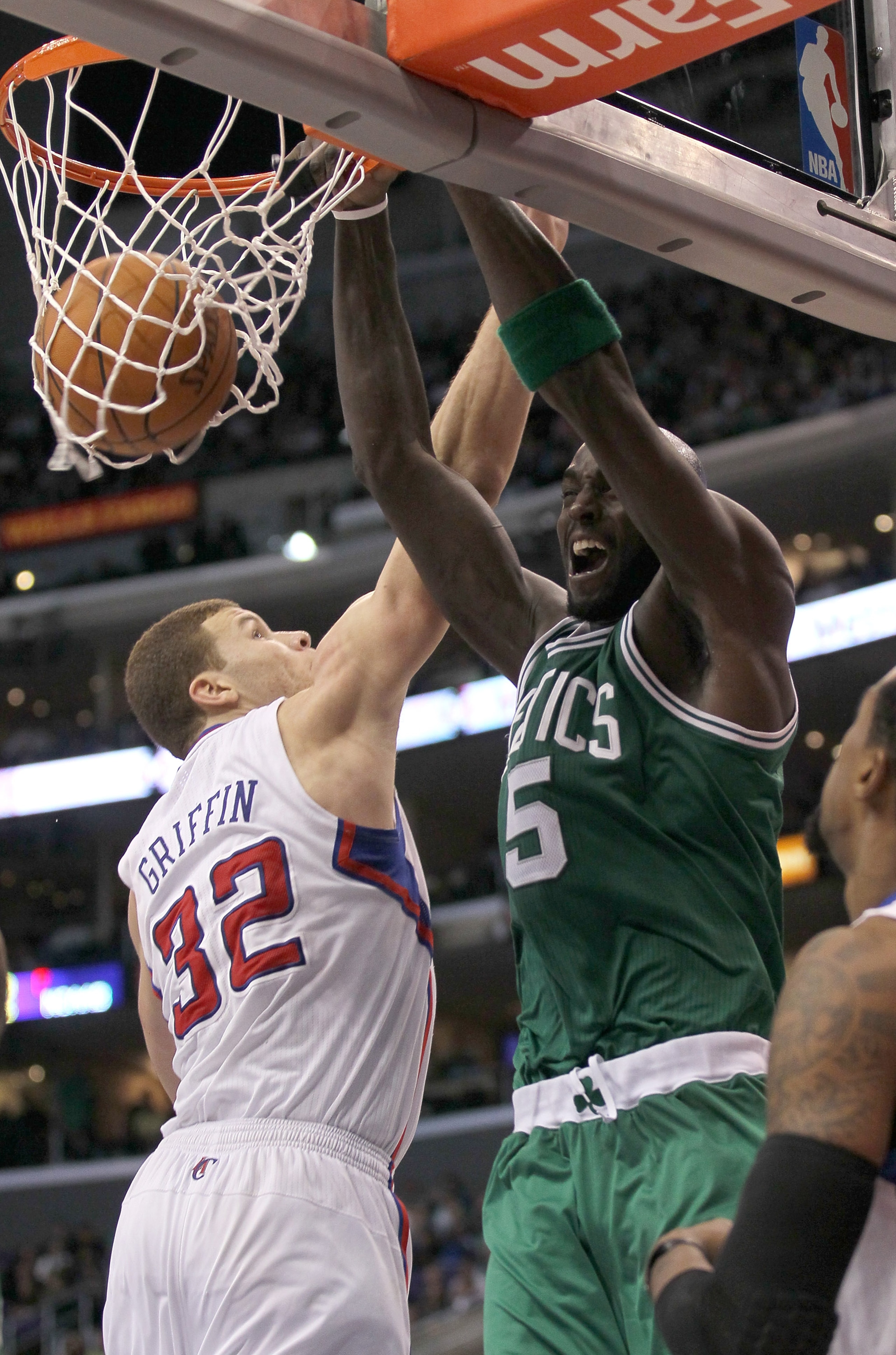 LOS ANGELES, CA - FEBRUARY 26:  Kevin Garnett #5 of the Boston Celtics dunks over Blake Griffin #32 of the Los Angeles Clippers at Staples Center on February 26, 2011  in Los Angeles, California.  The Celtics won 99-92.   NOTE TO USER: User expressly ackn