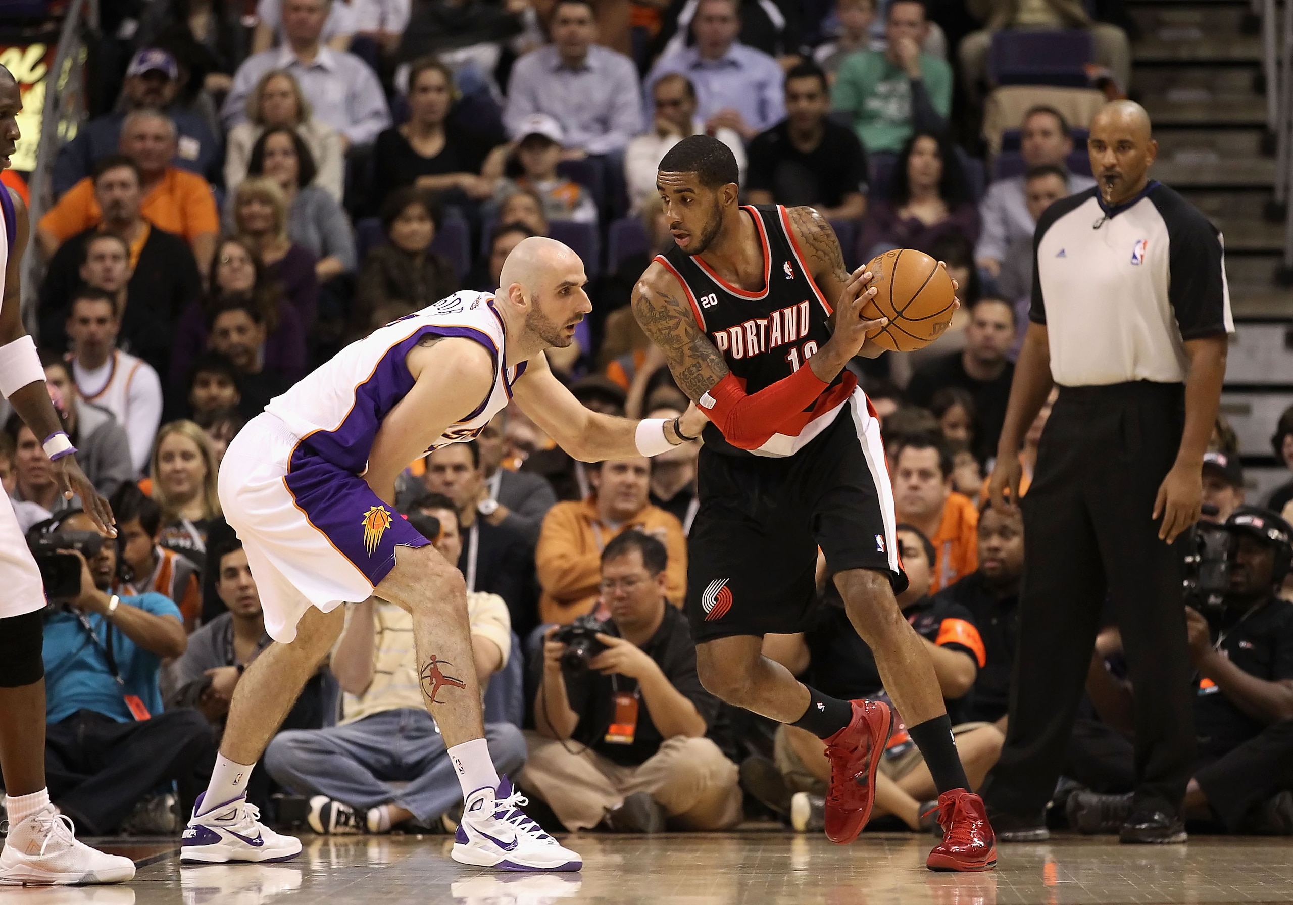 PHOENIX, AZ - JANUARY 14:  LaMarcus Aldridge #12 of the Portland Trail Blazers in action during the NBA game against the Phoenix Suns at US Airways Center on January 14, 2011 in Phoenix, Arizona. The Suns defeated the Trail Blazers 115-111. NOTE TO USER: