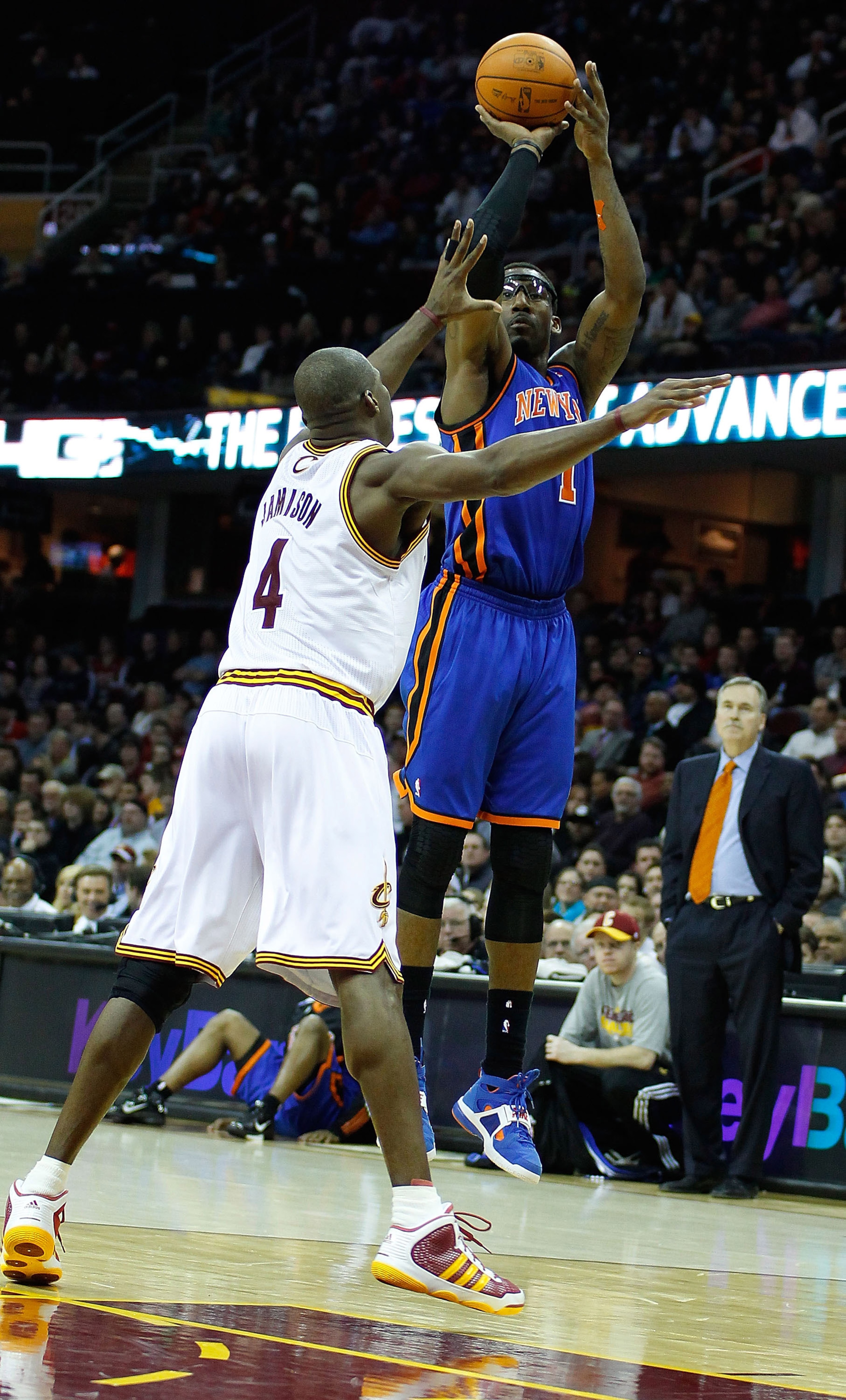 CLEVELAND, OH - FEBRUARY 25:  Amar'e Stoudemire #1 of the New York Knicks goes up for a shot over Antawn Jamison #4 of the Cleveland Cavaliers during the game on February 25, 2011 at Quicken Loans Arena in Cleveland, Ohio. NOTE TO USER: User expressly ack