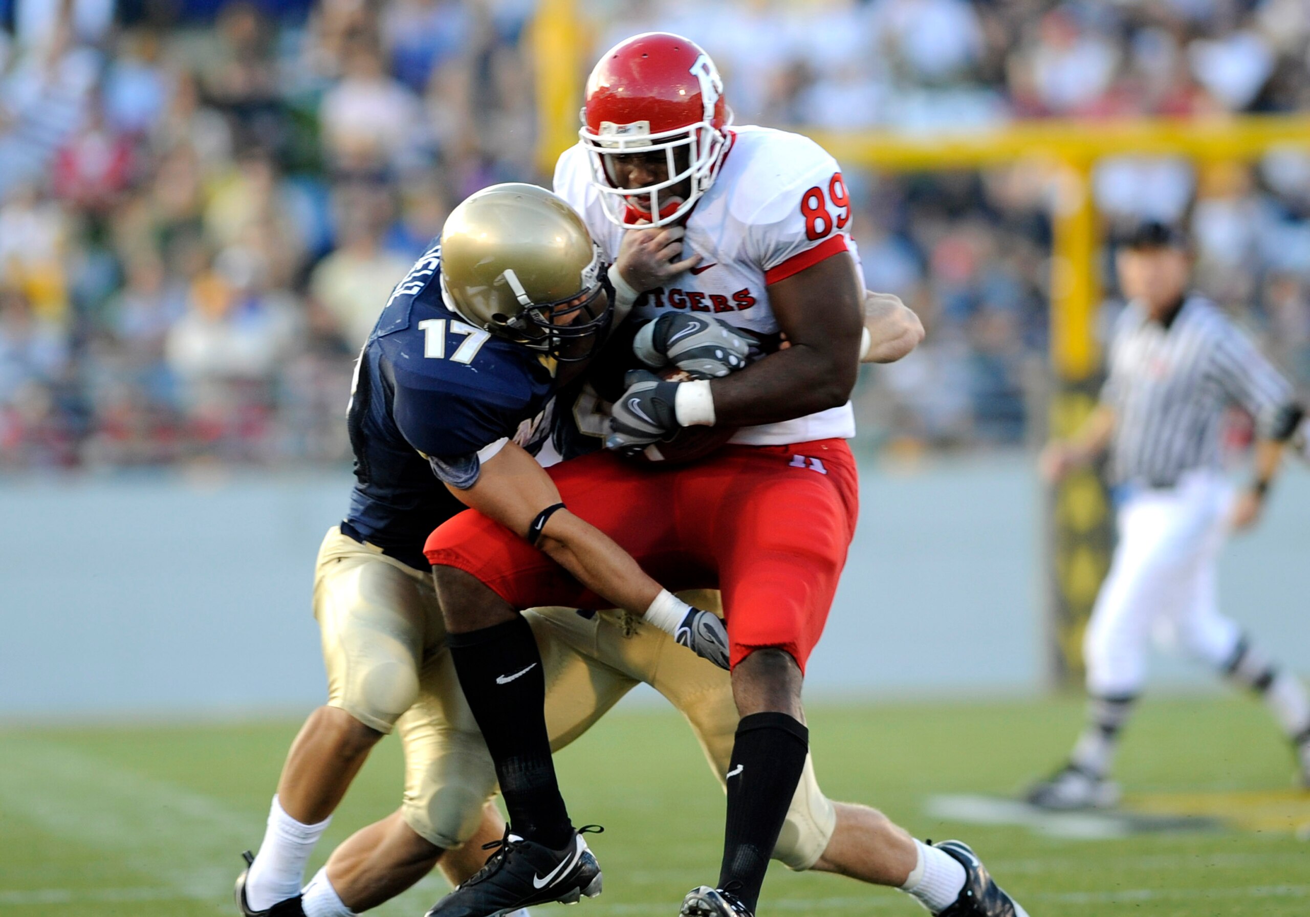 ANNAPOLIS, MD - SEPTEMBER 20: Wide receiver Kevin Brock #89 of the Rutgers Scarlet Knights grabs a pass against the Navy Midshipmen at Jack Stephens Field at Navy-Marine Corps Memorial Stadium on September 20, 2008 in Annapolis, Maryland.  (Photo by Al Me