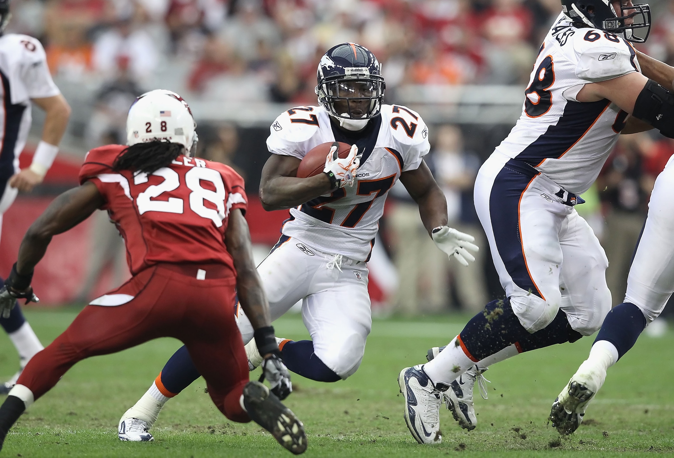GLENDALE, AZ - DECEMBER 12: Runningback Knowshon Moreno #27 of the Denver Broncos runs with the football during the NFL game against the Arizona Cardinals at the University of Phoenix Stadium on December 12, 2010 in Glendale, Arizona. The Cardinals defe GLENDALE, AZ - DECEMBER 12: Runningback Knowshon Moreno #27 of the Denver Broncos runs with the football during the NFL game against the Arizona Cardinals at the University of Phoenix Stadium on December 12, 2010 in Glendale, Arizona. The Cardinals defe