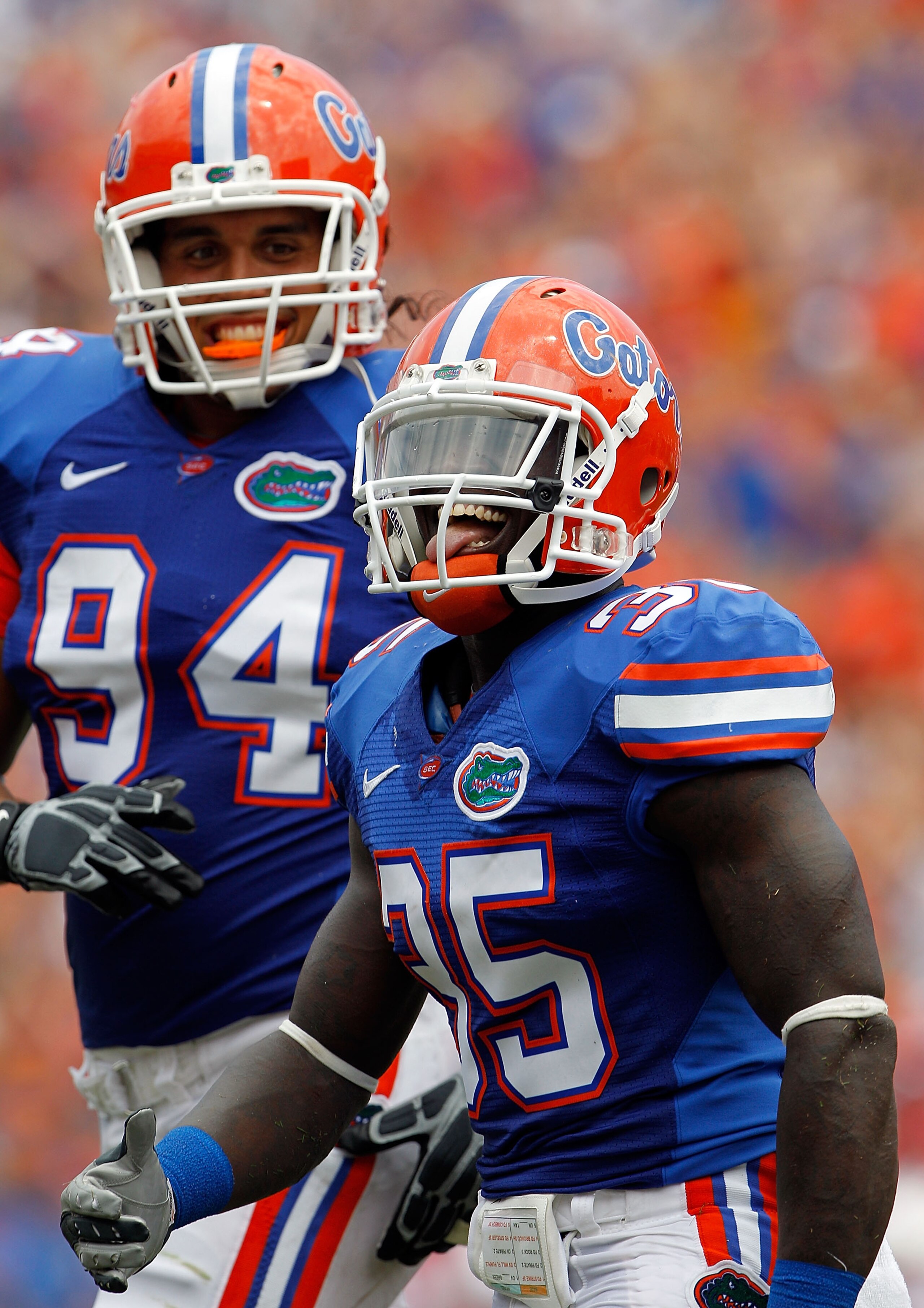 GAINESVILLE, FL - SEPTEMBER 04:  Ahmad Black #35 and Justin Trattou #94 of the Florida Gators celebrate after an interception against the Miami University RedHawks at Ben Hill Griffin Stadium on September 4, 2010 in Gainesville, Florida.  (Photo by Sam Gr