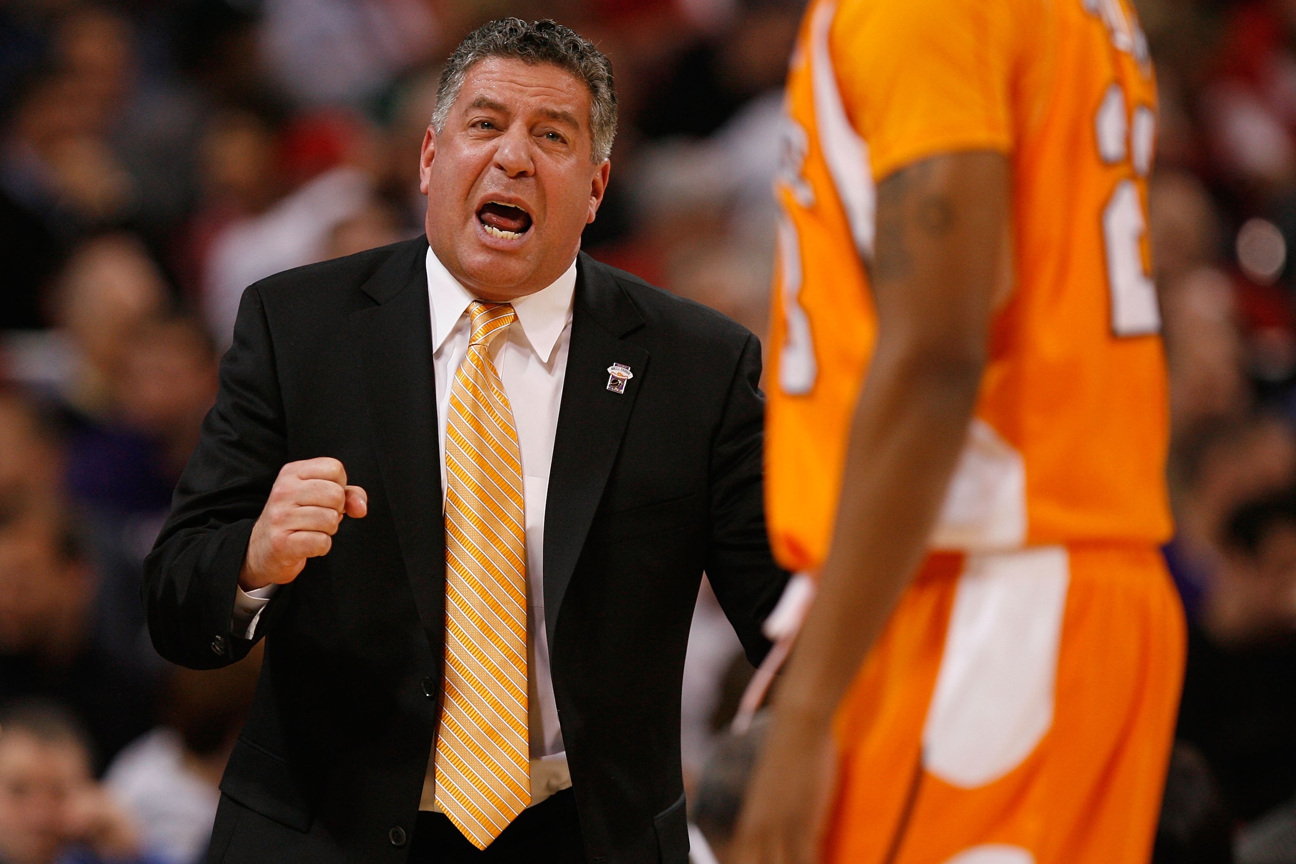 ST. LOUIS - MARCH 26: Head coach Bruce Pearl of the Tennessee Volunteers instructs his players against the Ohio State Buckeyes during the midwest regional semifinal of the 2010 NCAA men's basketball tournament at the Edward Jones Dome on March 26, 2010 in