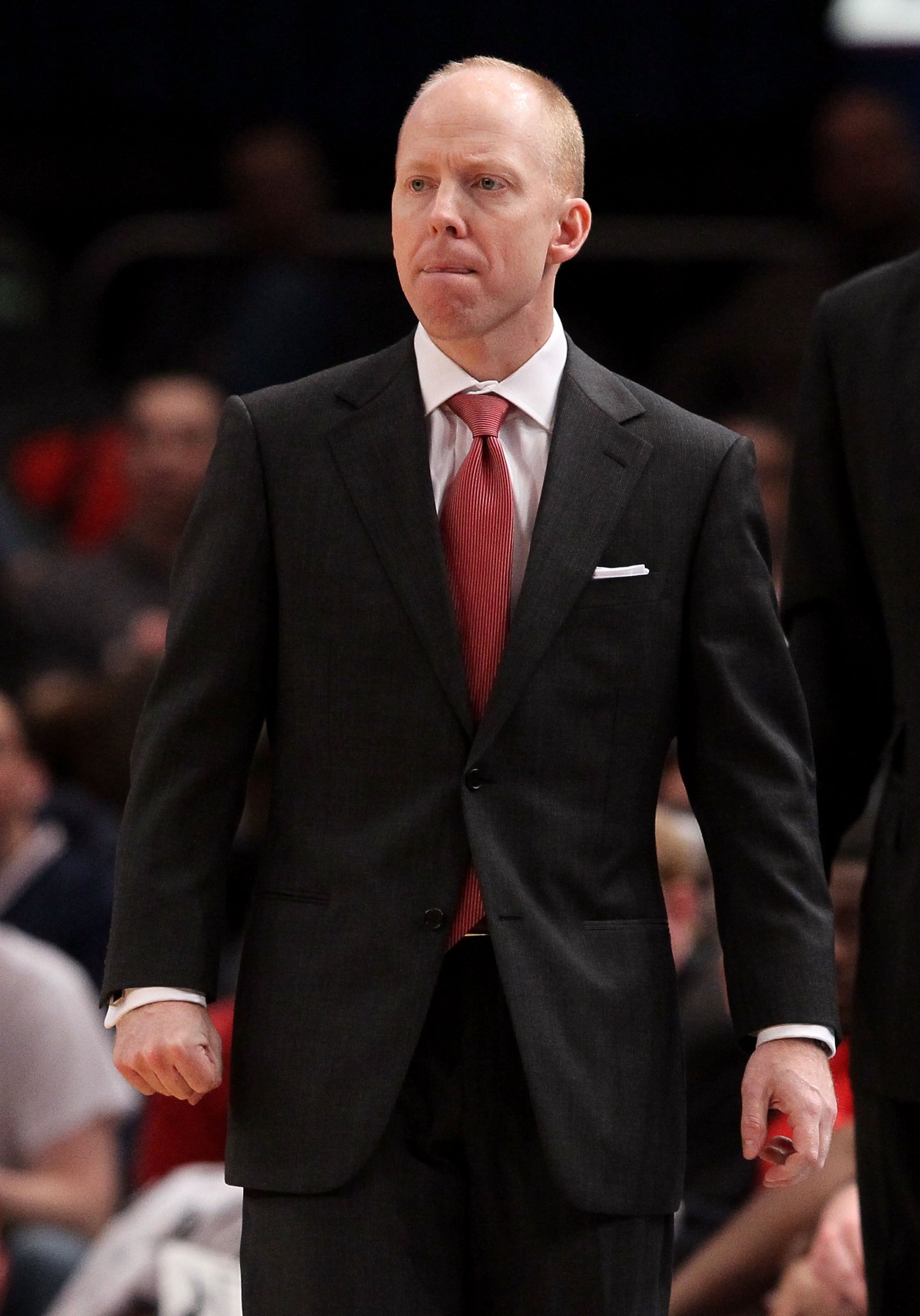 NEW YORK - MARCH 09:  Head coach Mick Cronin of the Cincinnati Bearcats looks on from the bench against the Rutgers Scarlet Knights during the first round game of the Big East Basketball Tournament at Madison Square Garden on March 9, 2010 in New York, Ne