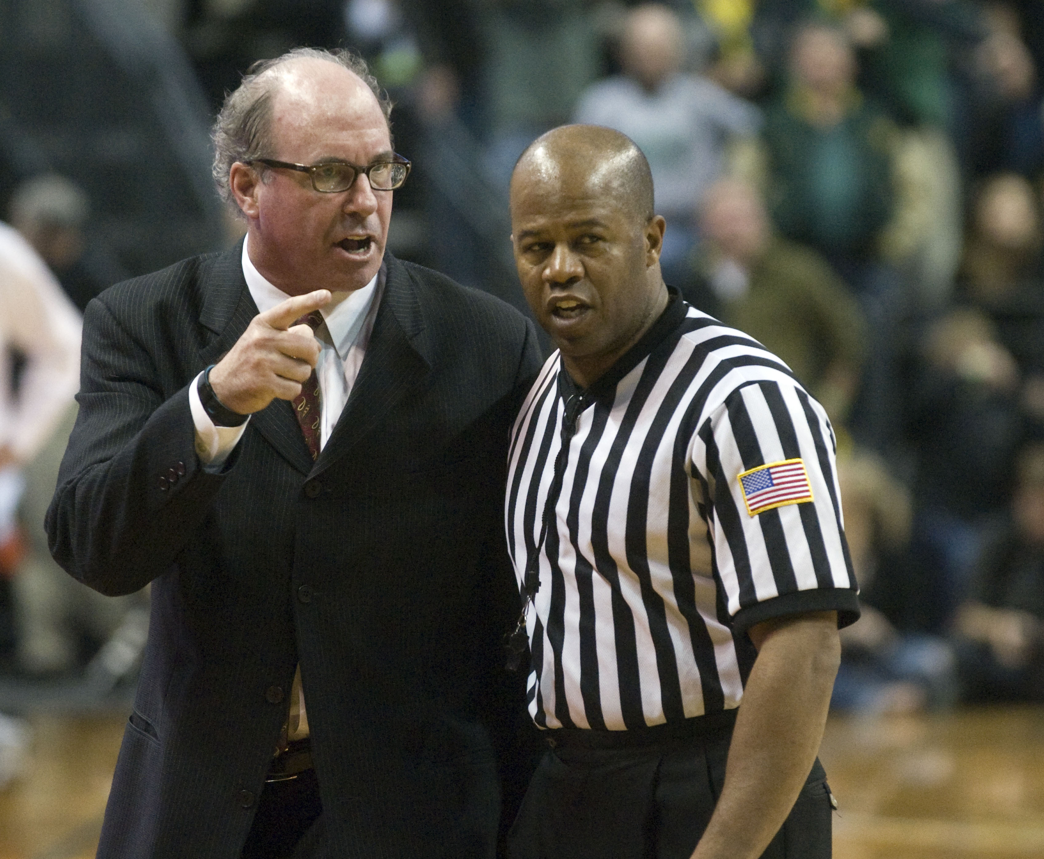EUGENE, OR - JANUARY 13: Head coach Kevin O'Neill of the USC Trojans has some words with an official during the second half of the game against the Oregon Ducks  at Matthew Knight Arena on January 13, 2011 in Eugene, Oregon. Oregon won the game 68-62. The