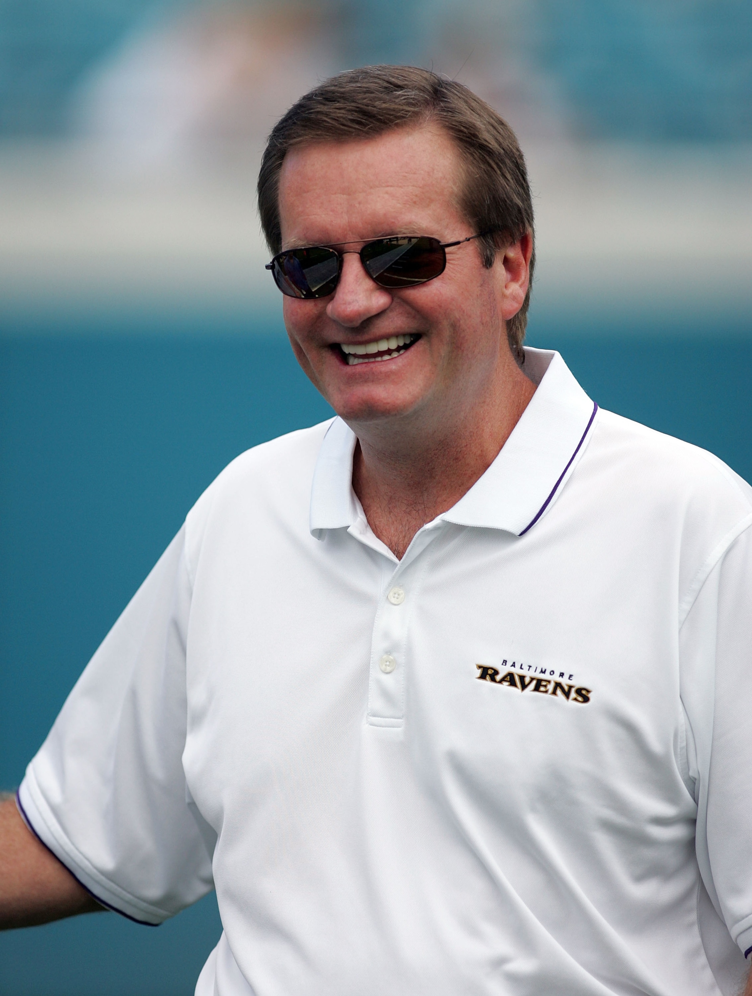 JACKSONVILLE, FL - NOVEMBER 13: Offensive coordinator Jim Fassel of the Baltimore Ravens shares a laugh on the field prior to taking on the Jacksonville Jaguars at Alltel Stadium on November 13, 2005 in Jacksonville, Florida.  (Photo by Doug Benc/Getty Im