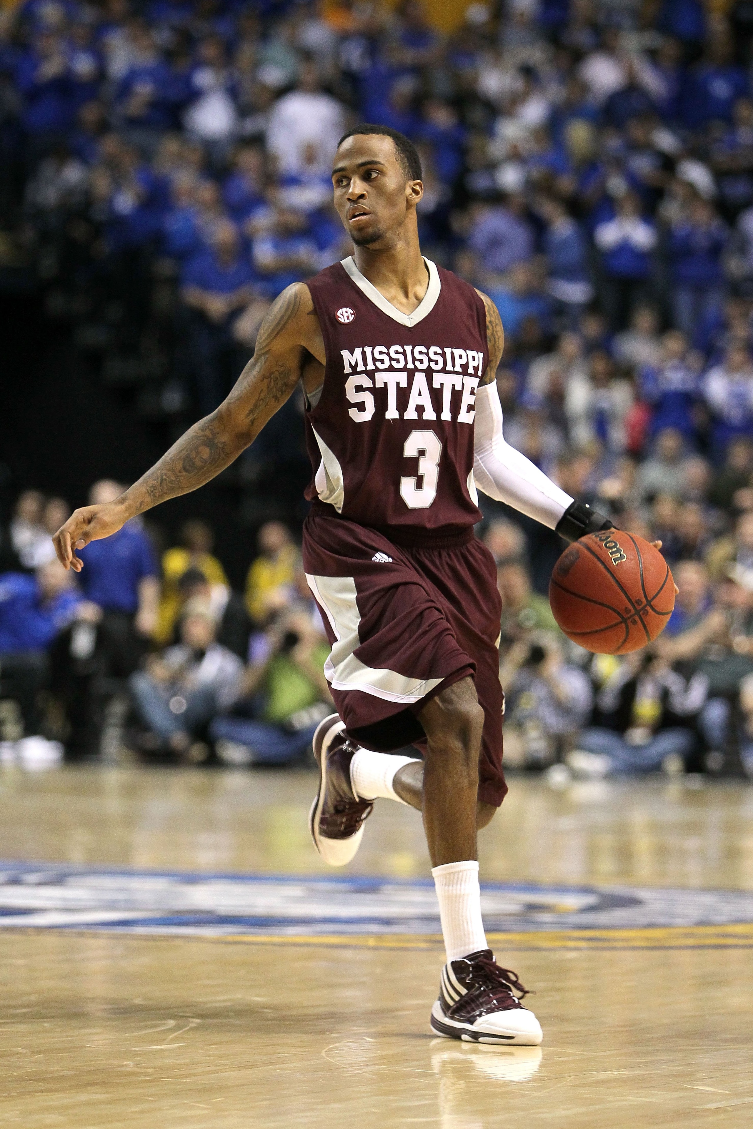 NASHVILLE, TN - MARCH 14:  Dee Bost #3 of the Mississippi State Bulldogs runs the offense against the Kentucky Wildcats during the final of the SEC Men's Basketball Tournament at the Bridgestone Arena on March 14, 2010 in Nashville, Tennessee. Kentucky wo