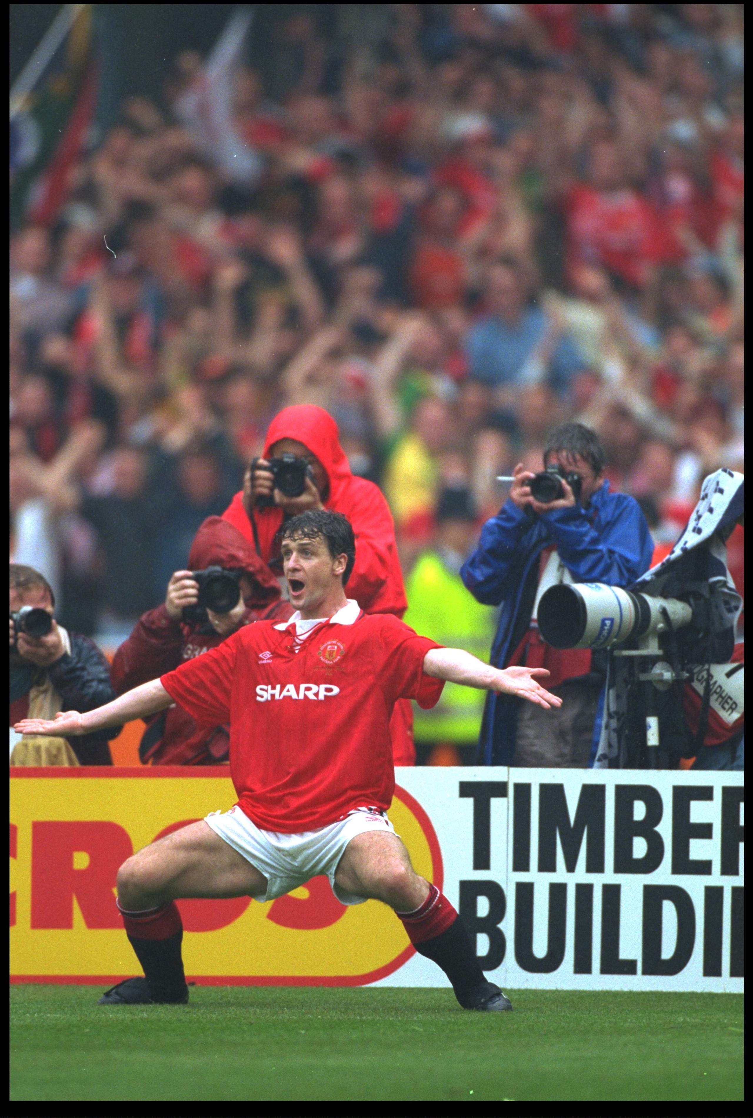 14 MAY 1994:  MARK HUGHES OF MANCHESTER UNITED CELEBRATES AFTER SCORING THE THIRD GOAL IN THE FA CUP FINAL AGAINST CHELSEA PLAYED AT WEMBLEY. MANCHESTER WON THE MATCH 4-0.