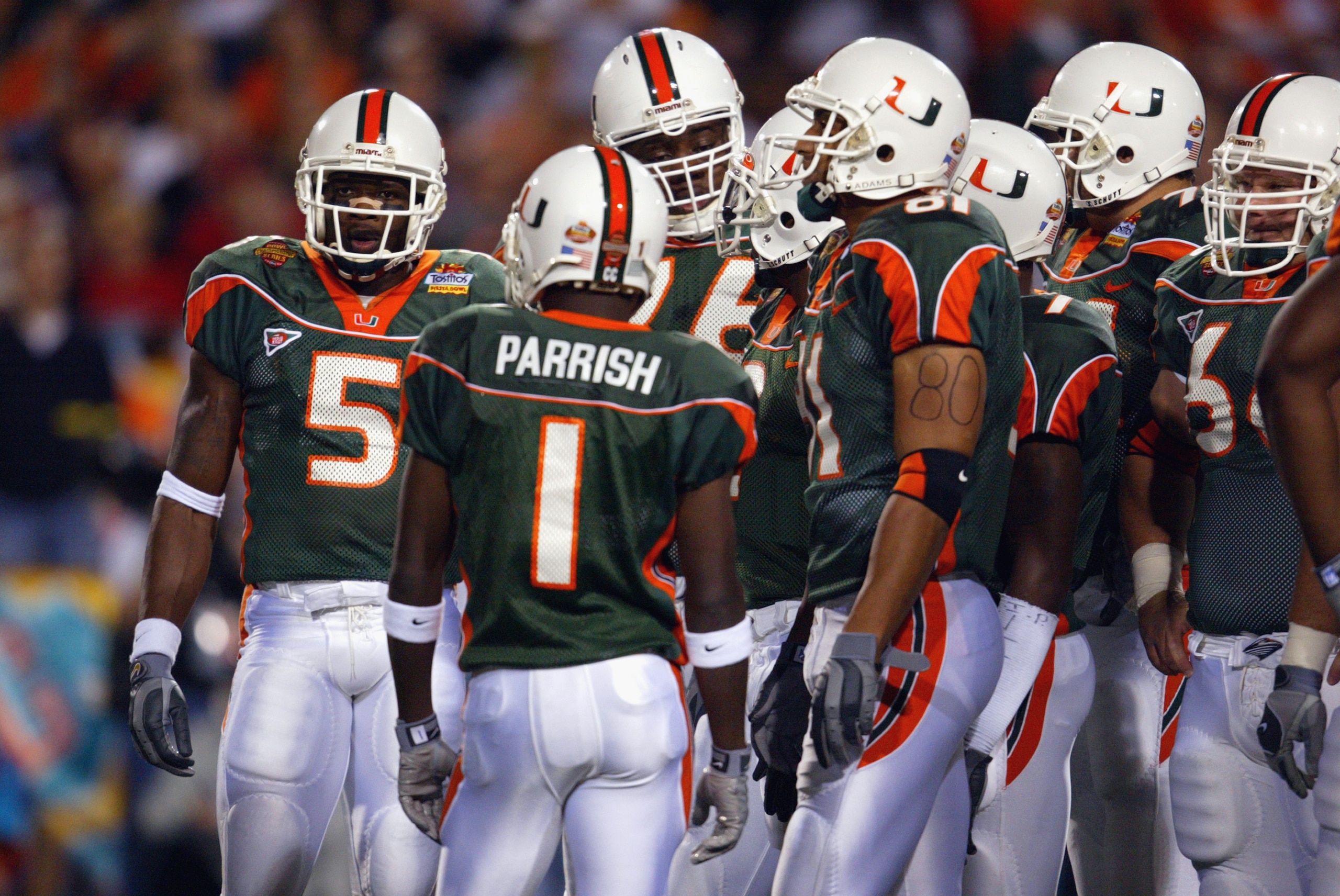 TEMPE, AZ - JANUARY 3:  University of Miami Hurricanes receiver Roscoe Parrish #1 stands with receiver Andre Johnson #5 and the rest of the Miami offense during the Tostitos Fiesta Bowl game against the Ohio State Buckeyes at Sun Devil Stadium on January