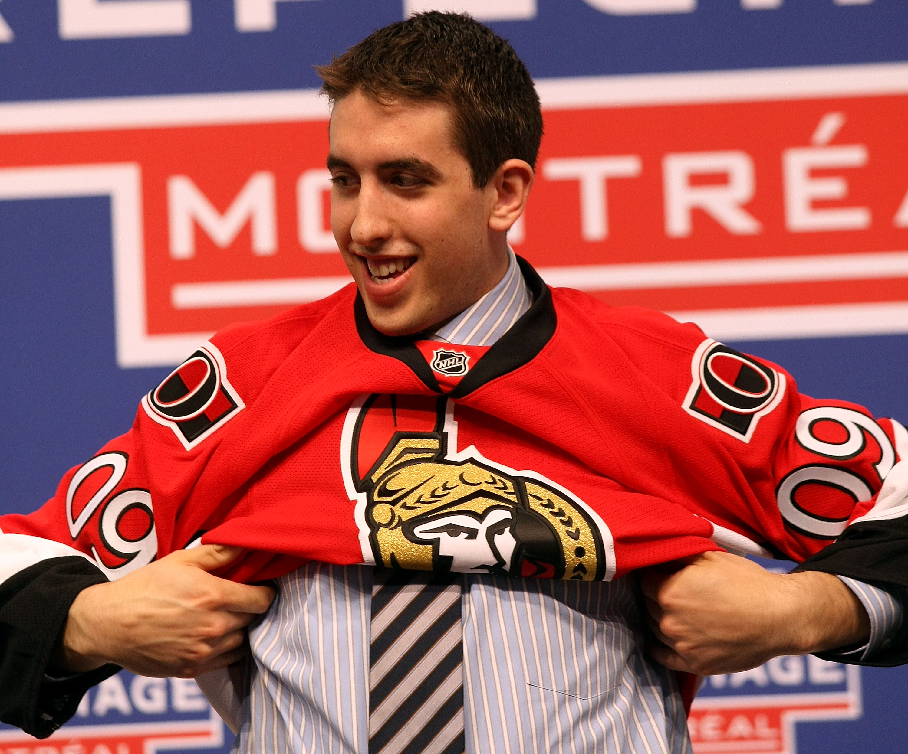 MONTREAL, QC - JUNE 26: Jared Cowen puts on his new Ottawa Senators sweater after he was selected #9 overall by the Senators during the first round of the 2009 NHL Entry Draft at the Bell Centre on June 26, 2009 in Montreal, Quebec, Canada. (Photo by Br