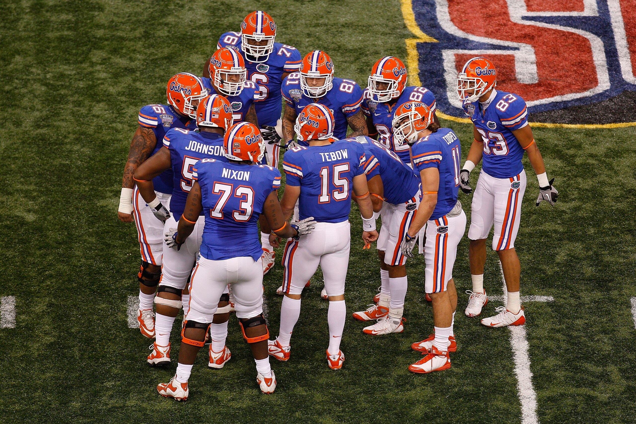 NEW ORLEANS - JANUARY 01:  Tim Tebow #15 of the Florida Gators stands in the huddle during the game against the Cincinnati Bearcats during the Allstate Sugar Bowl at the Louisana Superdome on January 1, 2010 in New Orleans, Louisiana.  (Photo by Chris Gra