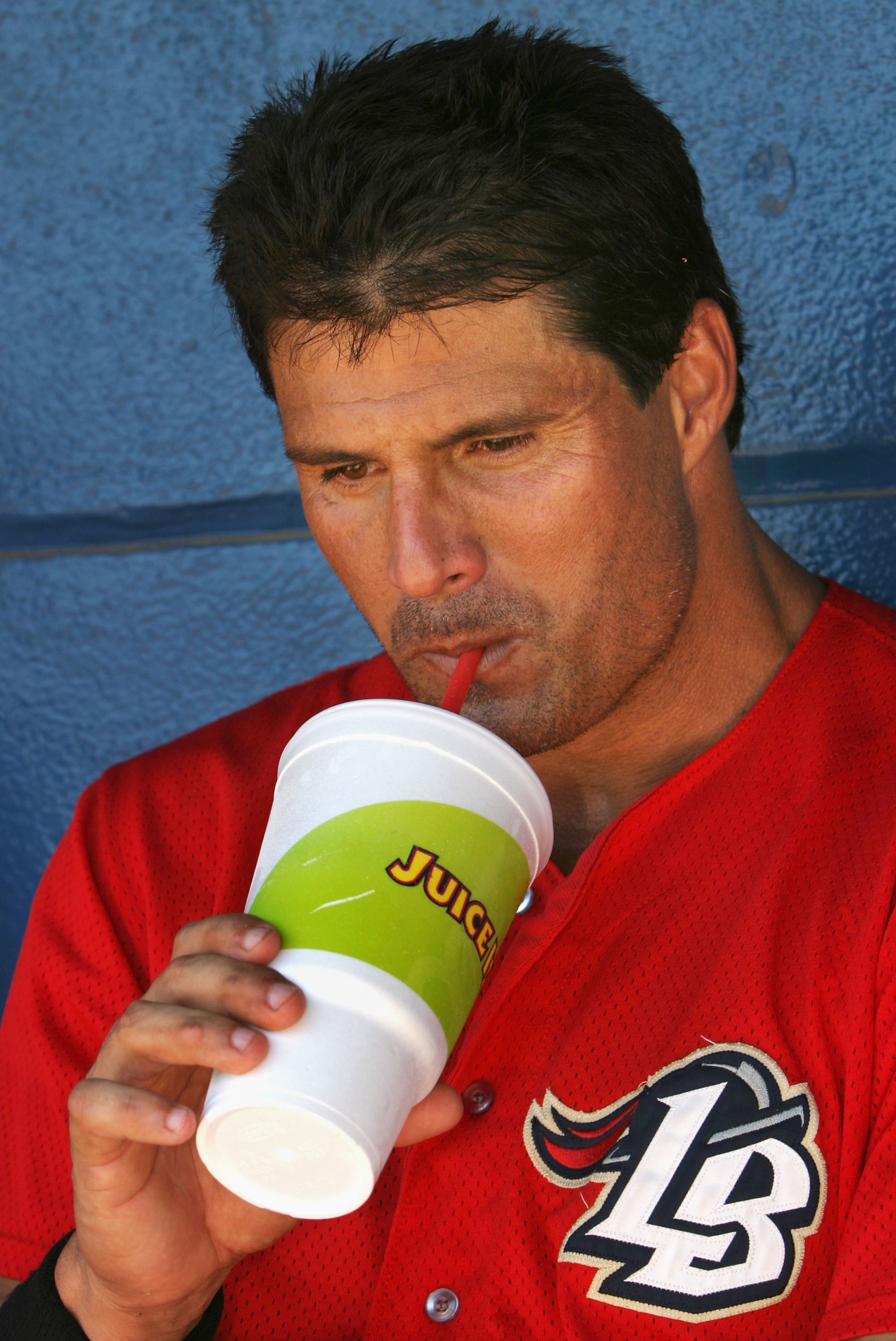 LONG BEACH, CA - JULY 16: Jose Canseco #33 of the Long Beach Armada drinks a juice drink while resting in between Golden Baseball League games against the Fullerton Flyers on July 16, 2006 at Blair Field in Long Beach, California. (Photo By Christian Pe LONG BEACH, CA - JULY 16: Jose Canseco #33 of the Long Beach Armada drinks a juice drink while resting in between Golden Baseball League games against the Fullerton Flyers on July 16, 2006 at Blair Field in Long Beach, California. (Photo By Christian Pe