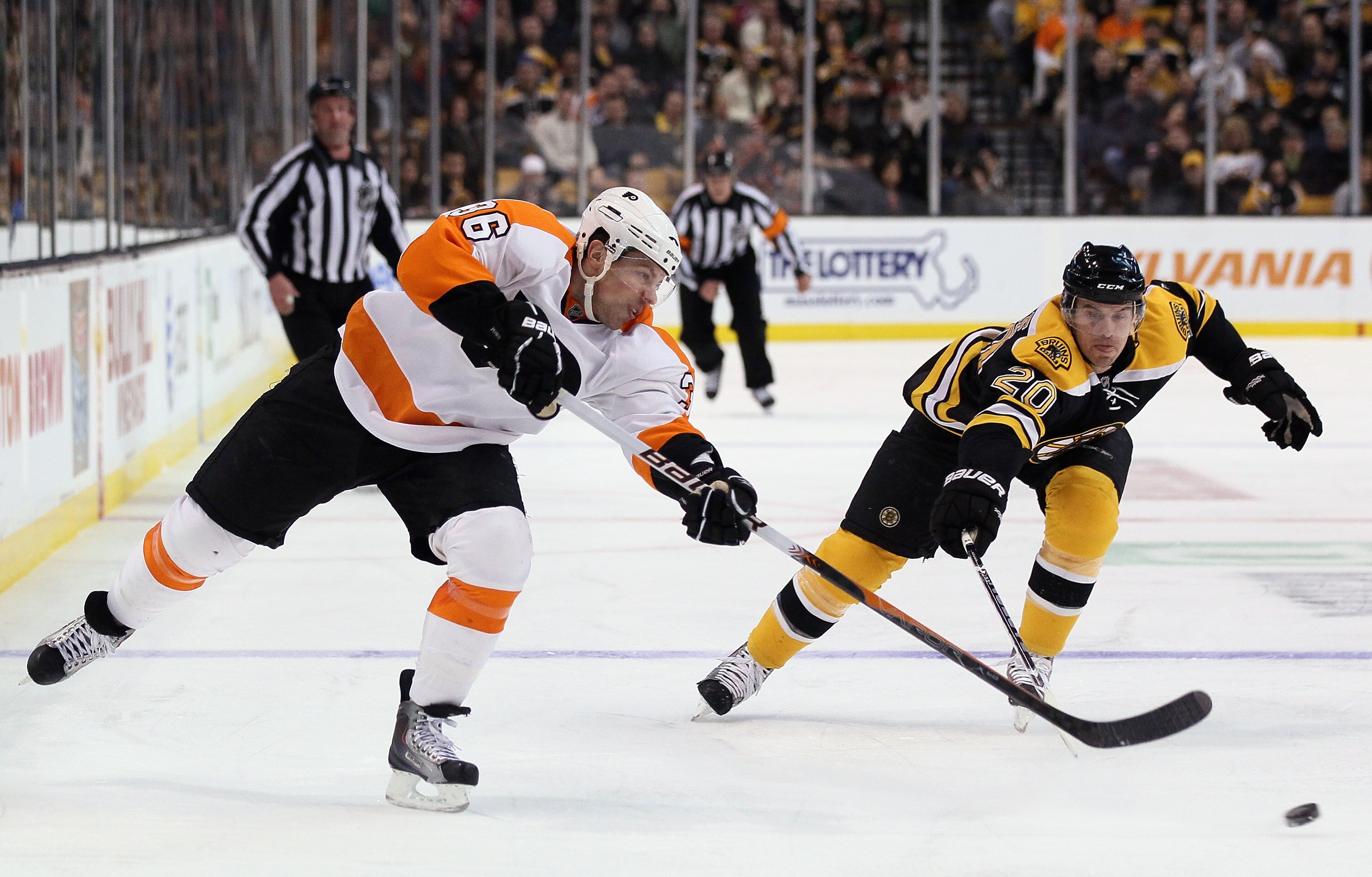 BOSTON, MA - JANUARY 13:  Darroll Powe #36 of the Philadelphia Flyers takes a shto as Daniel Paille #20 of the Boston Bruins defends on January 13, 2011 at the TD Garden in Boston, Massachusetts.  (Photo by Elsa/Getty Images)