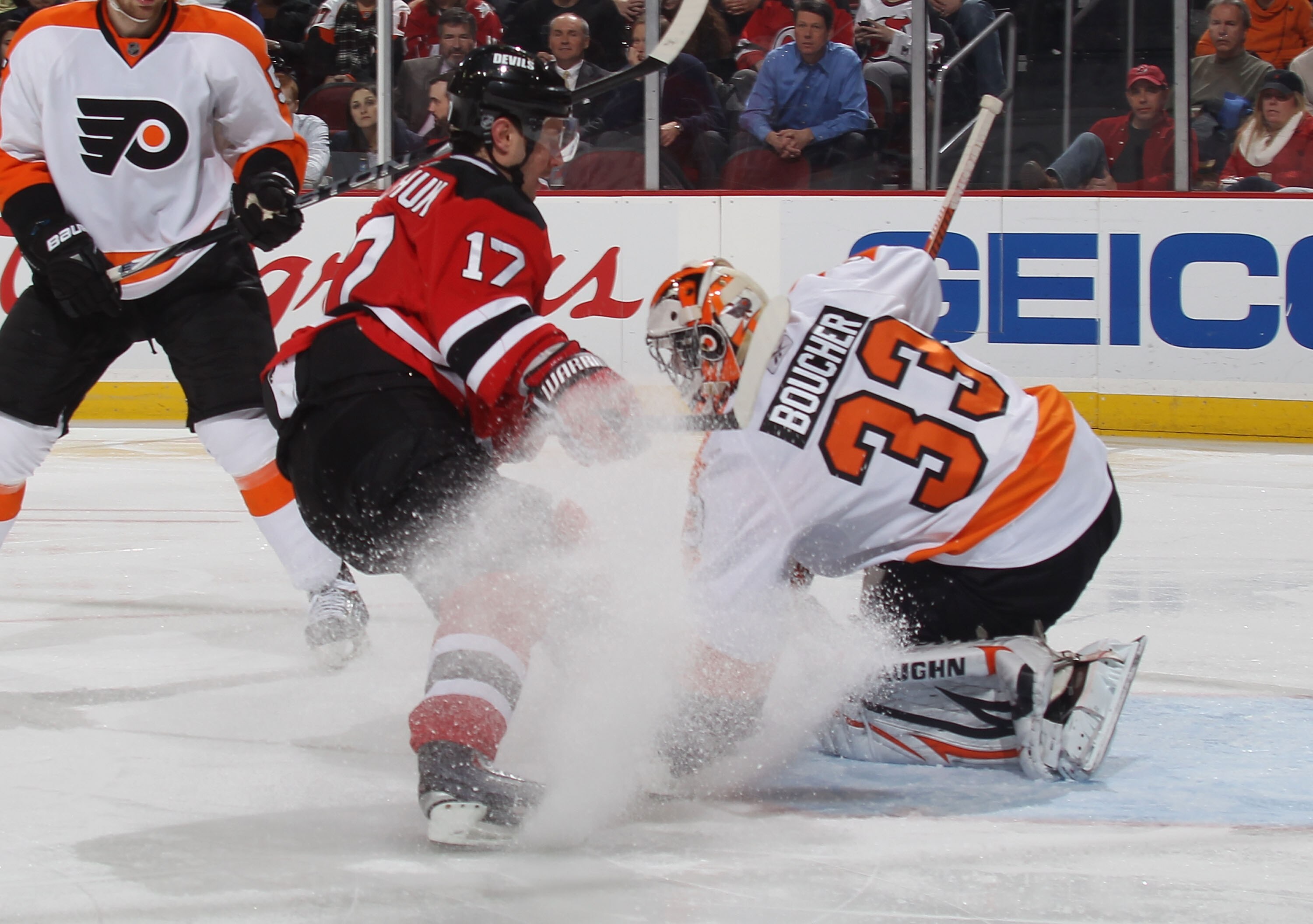 NEWARK, NJ - JANUARY 06: Brian Boucher #33 of the Philadelphia Flyers covers the puck as Ilya Kovalchuk #17 of the New Jersey Devils looks for a rebound at the Prudential Center on January 6, 2011 in Newark, New Jersey. The Flyers defeated the Devils 4-2.