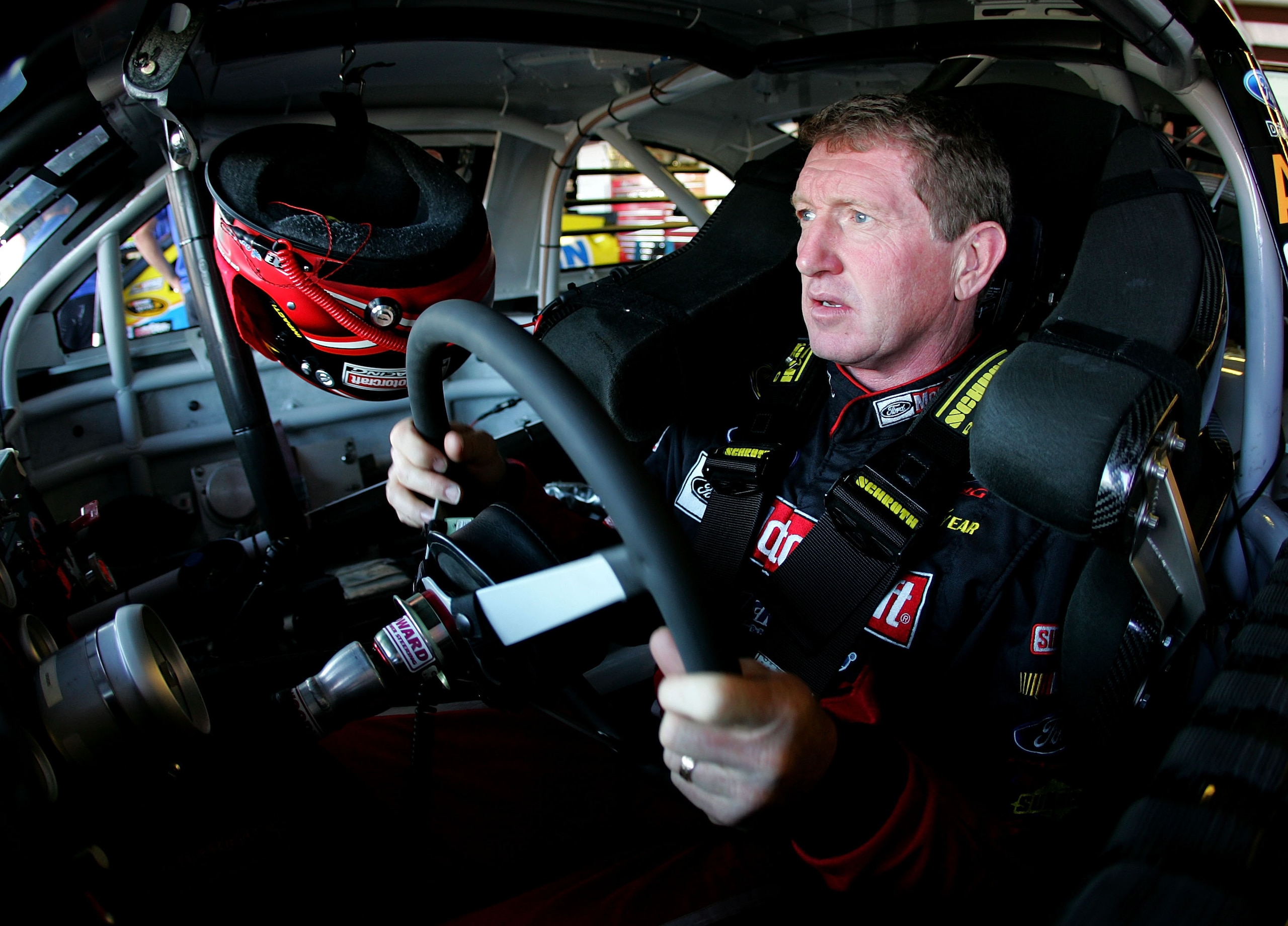 TALLADEGA, AL - OCTOBER 29:  Bill Elliott, driver of the #26 Air Guard Chevrolet, sits in his car during practice for the NASCAR Sprint Cup Series AMP Energy Juice 500 at Talladega Superspeedway on October 29, 2010 in Talladega, Alabama.  (Photo by Jerry